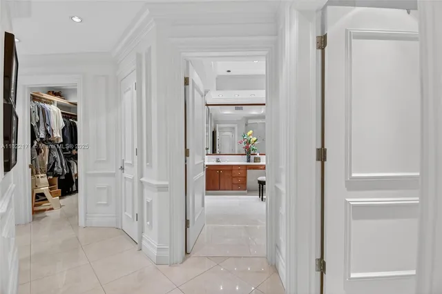 a view of hall way with furniture