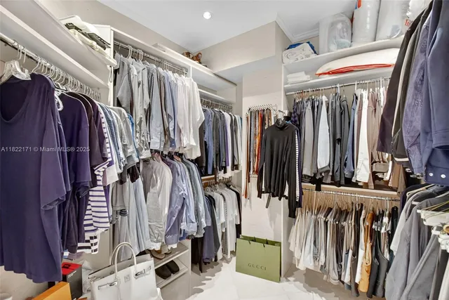 a view of living room with furniture and a chandelier