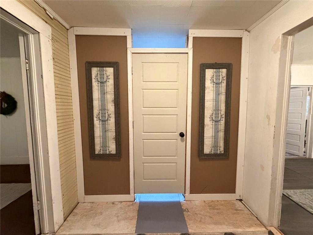 209 Old Perry Road Marshallville, GA 31057 - Photo 39 of 40 a view of a hallway with wooden floor and closet area