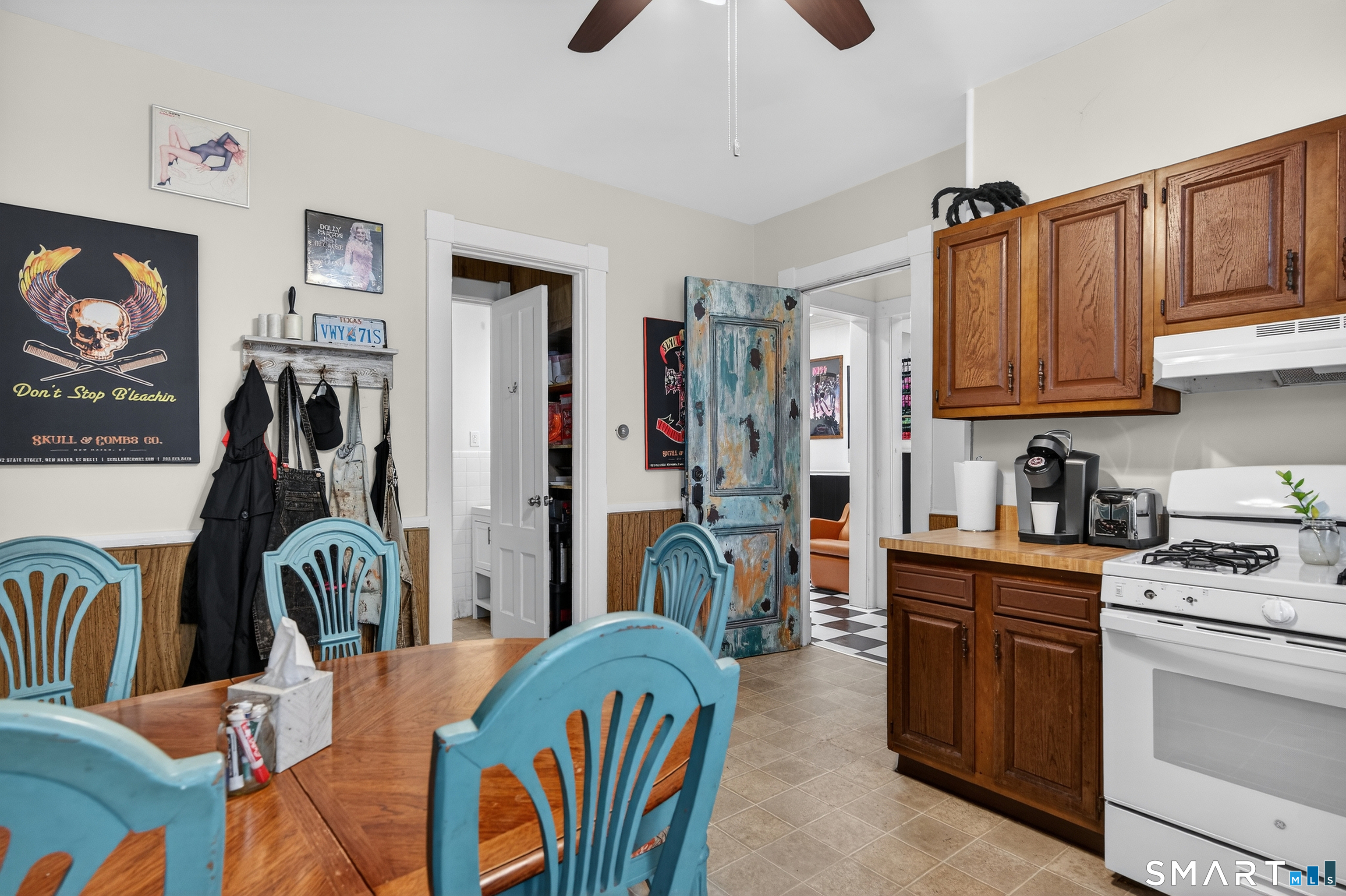 832 State Street New Haven, CT 06511 - Photo 16 of 39 a living room with furniture a flat screen tv and a stove