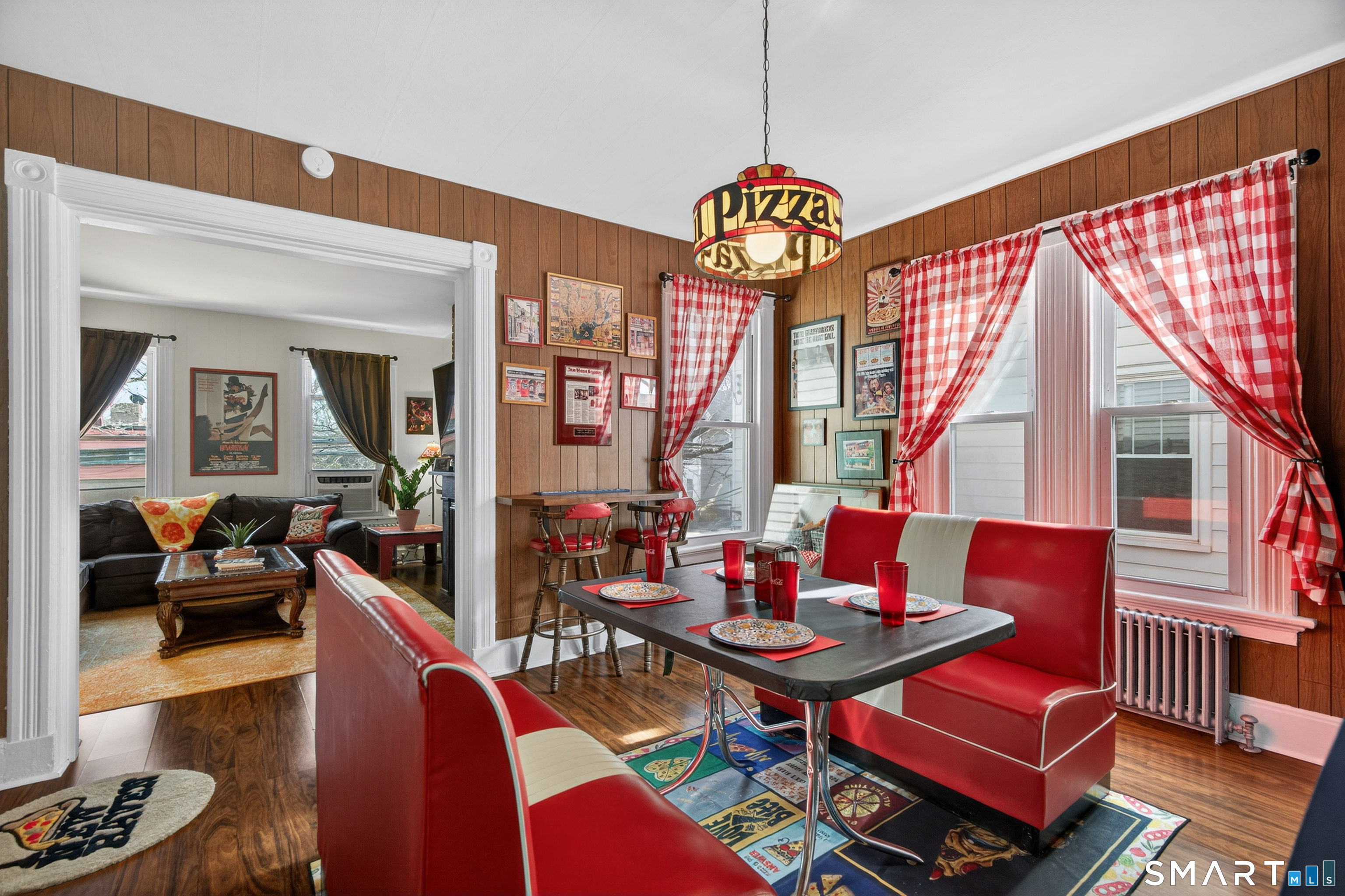 832 State Street New Haven, CT 06511 - Photo 22 of 39 a living room with furniture a fireplace and a chandelier