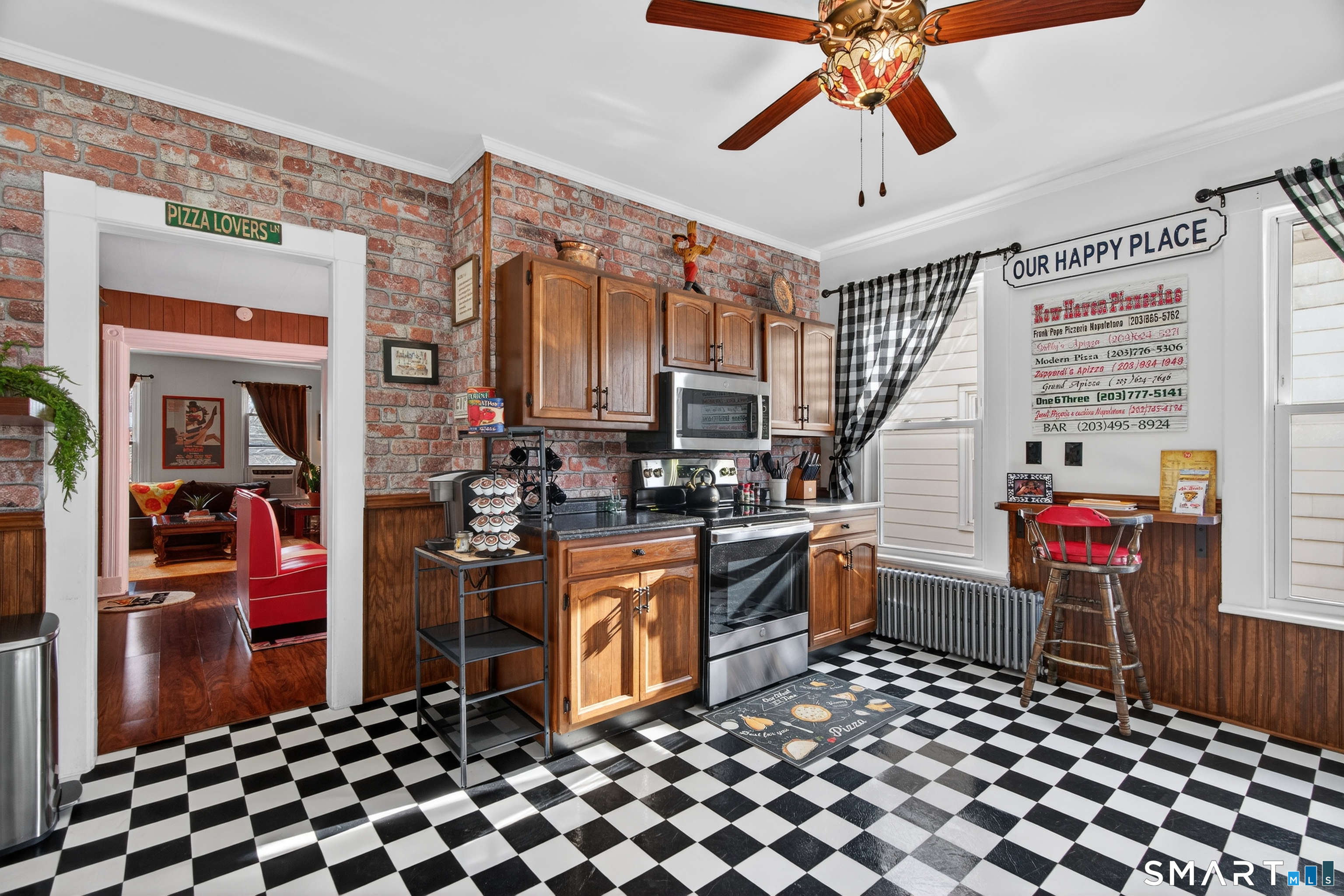 832 State Street New Haven, CT 06511 - Photo 23 of 39 a kitchen with stainless steel appliances kitchen island granite countertop a sink and cabinets