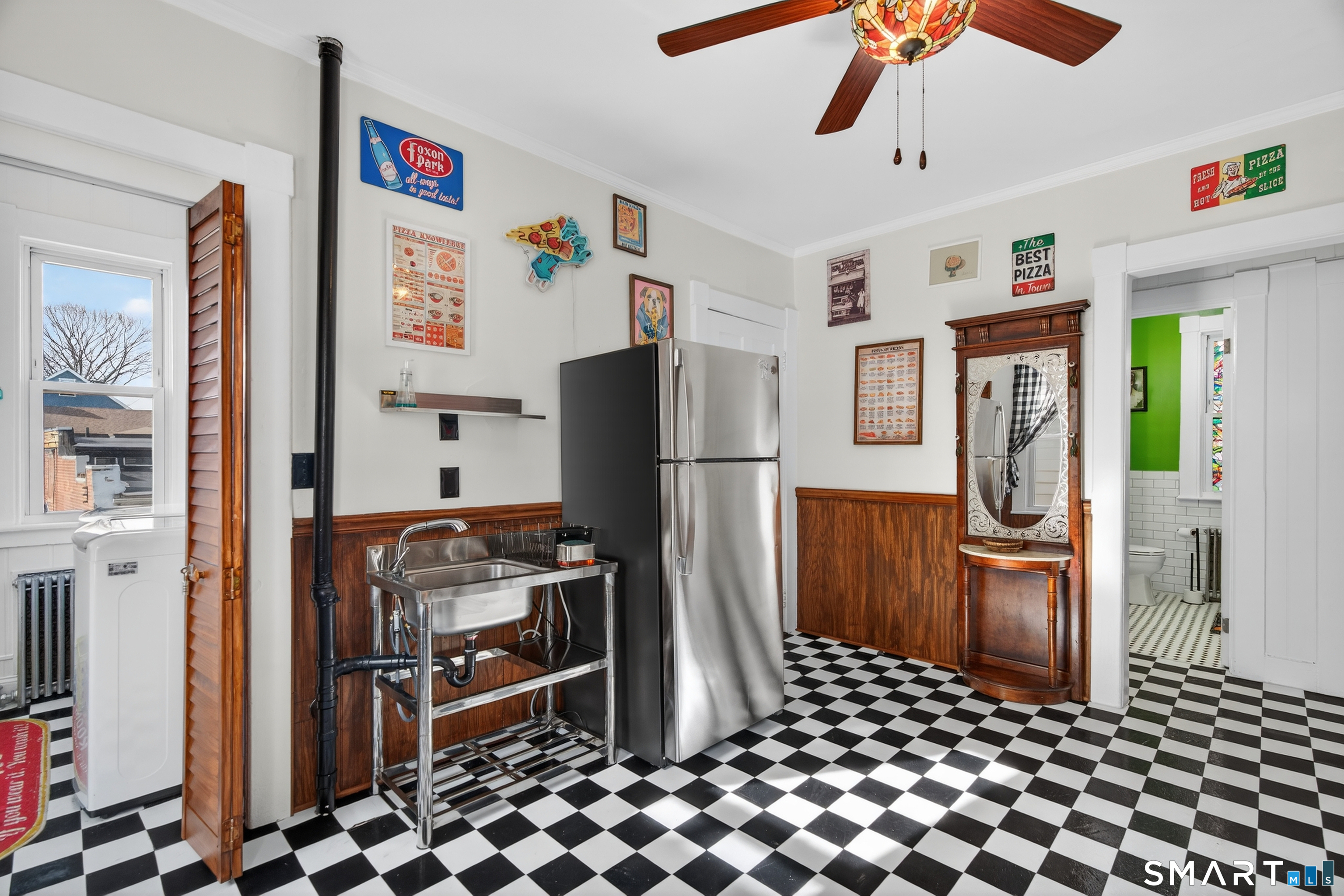 832 State Street New Haven, CT 06511 - Photo 25 of 39 a kitchen with stainless steel appliances a refrigerator and a stove top oven
