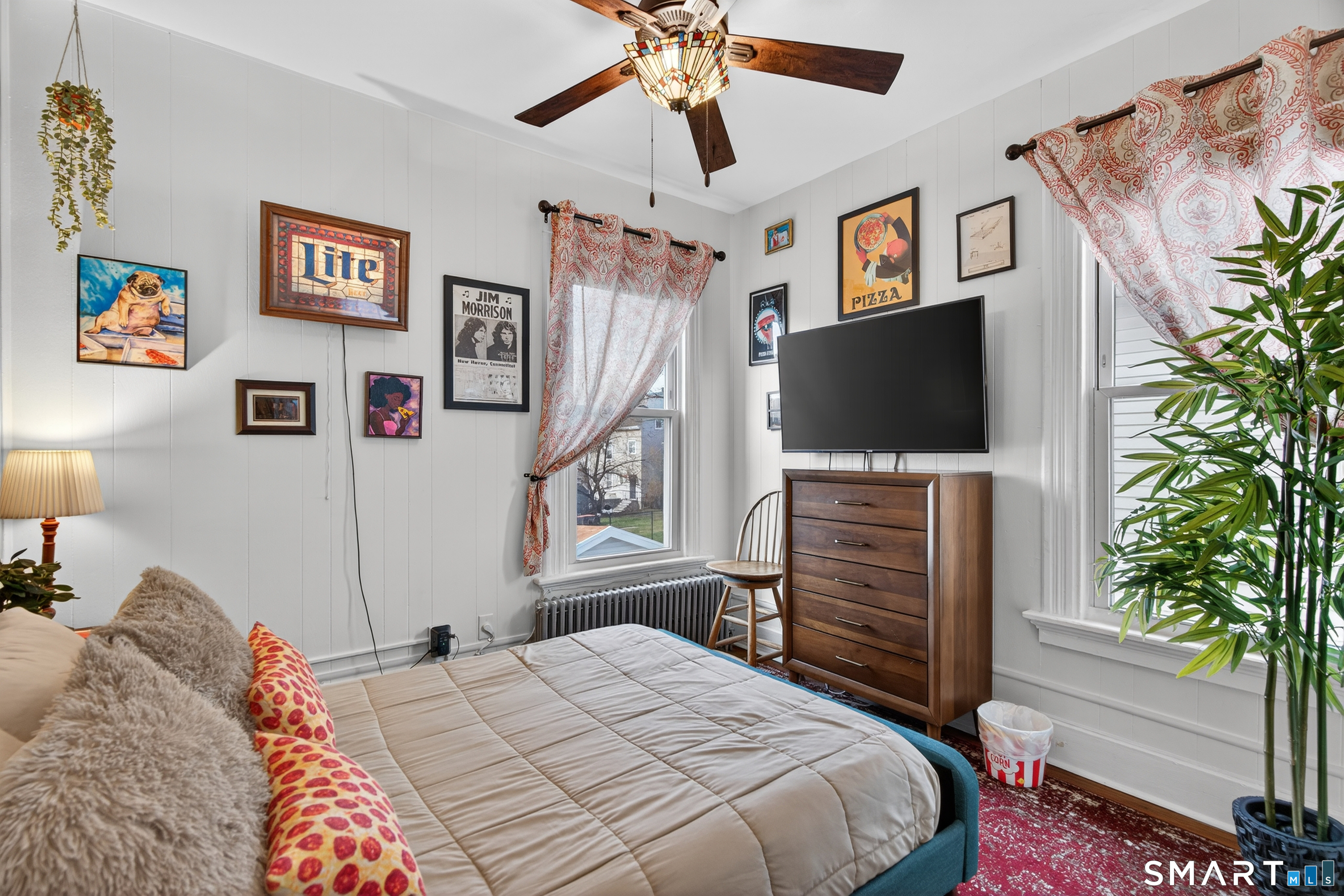 832 State Street New Haven, CT 06511 - Photo 29 of 39 a bedroom with a bed and a flat screen tv