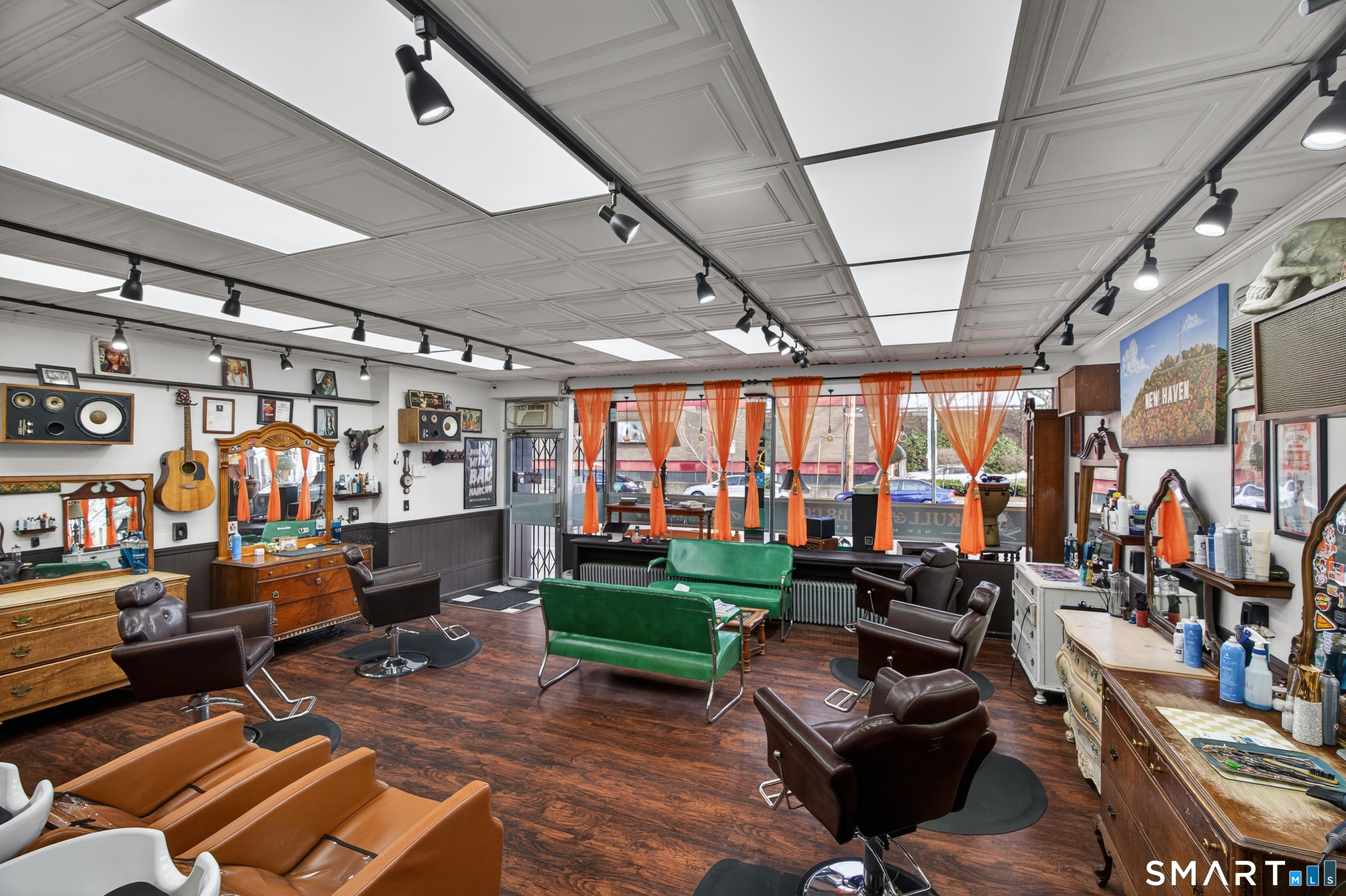 832 State Street New Haven, CT 06511 - Photo 4 of 39 a living room with lots of furniture and a flat screen tv