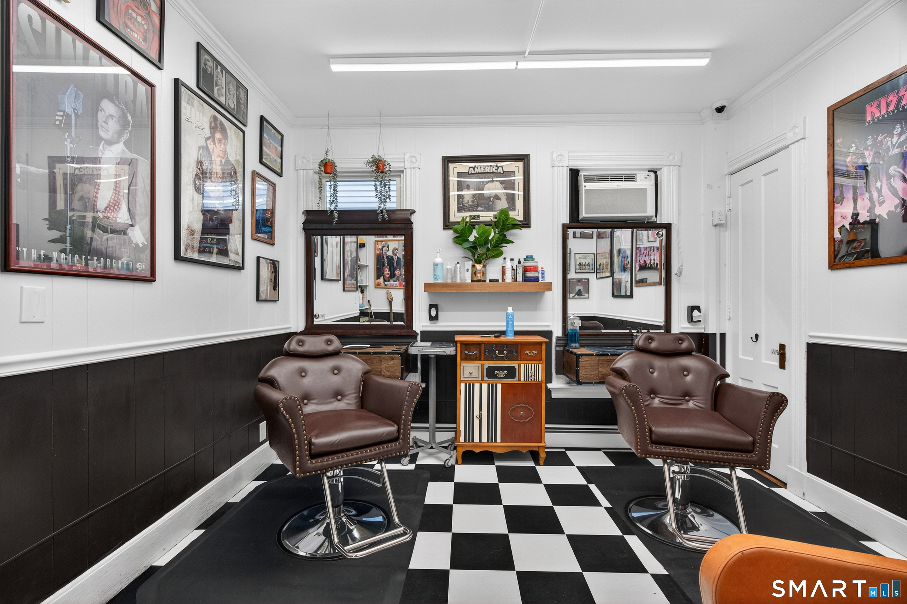 832 State Street New Haven, CT 06511 - Photo 8 of 39 a work room with furniture and paintings on the wall