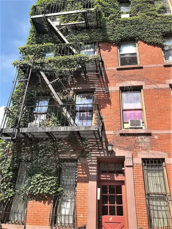 front view of a house with large windows