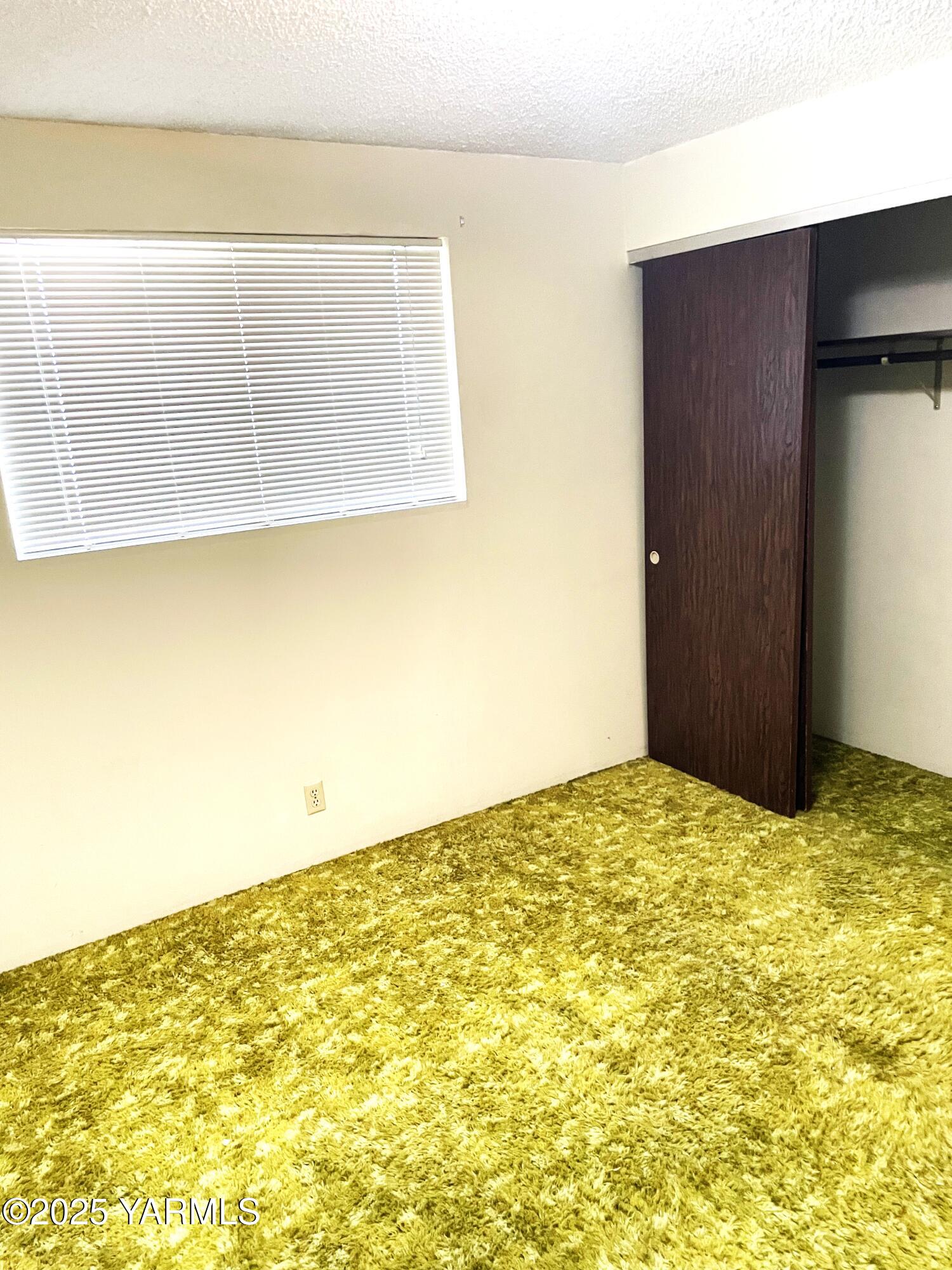 703 South 38th Avenue, Unit 8 Yakima, WA 98902 - Photo 10 of 10 a view of empty room