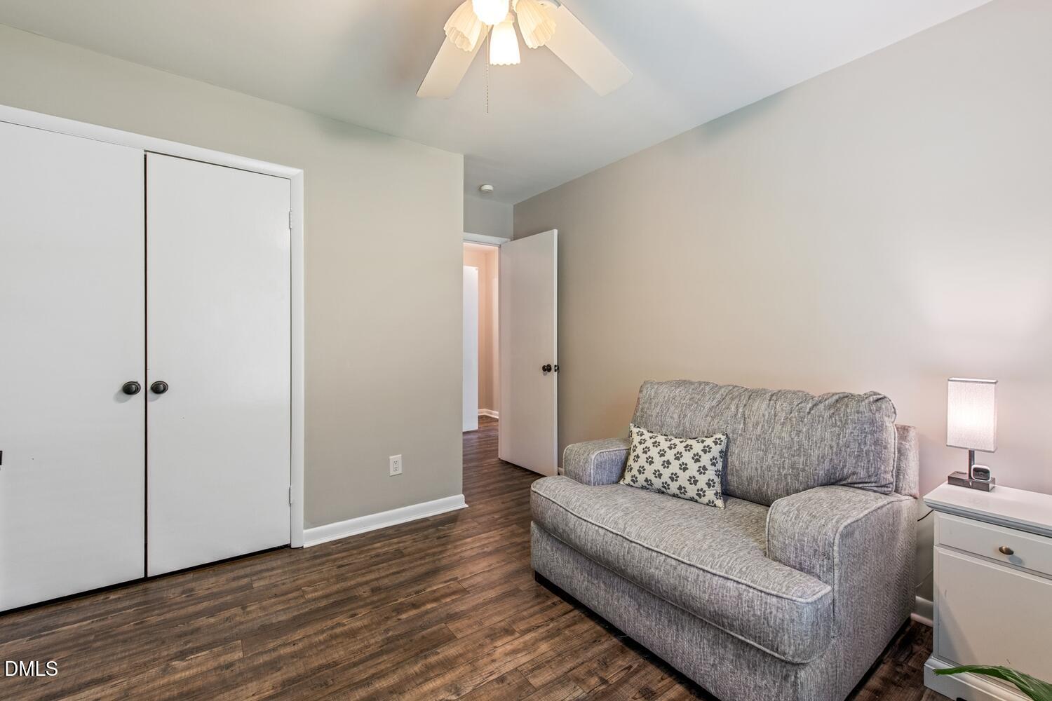 134 Longview Road Madison, NC 27025 - Photo 37 of 49 a living room with furniture and a ceiling fan