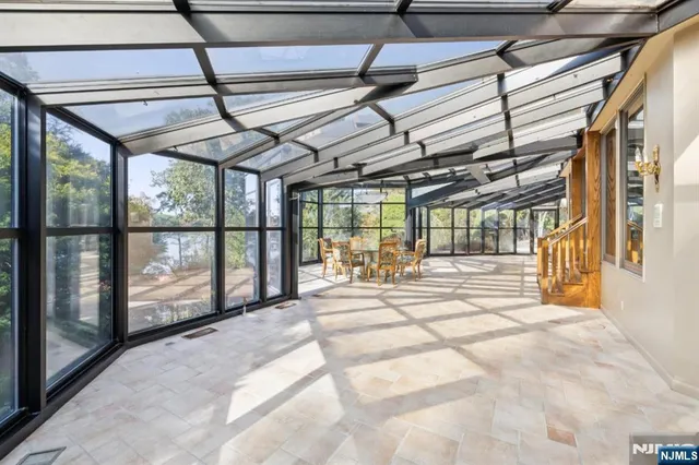 a view of a room with wooden walls