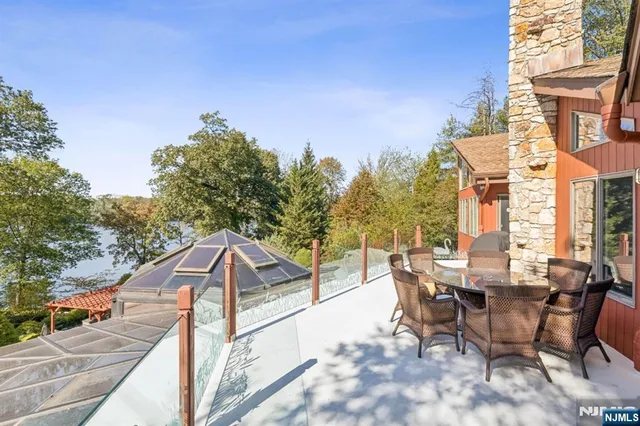 a view of a terrace with furniture and garden