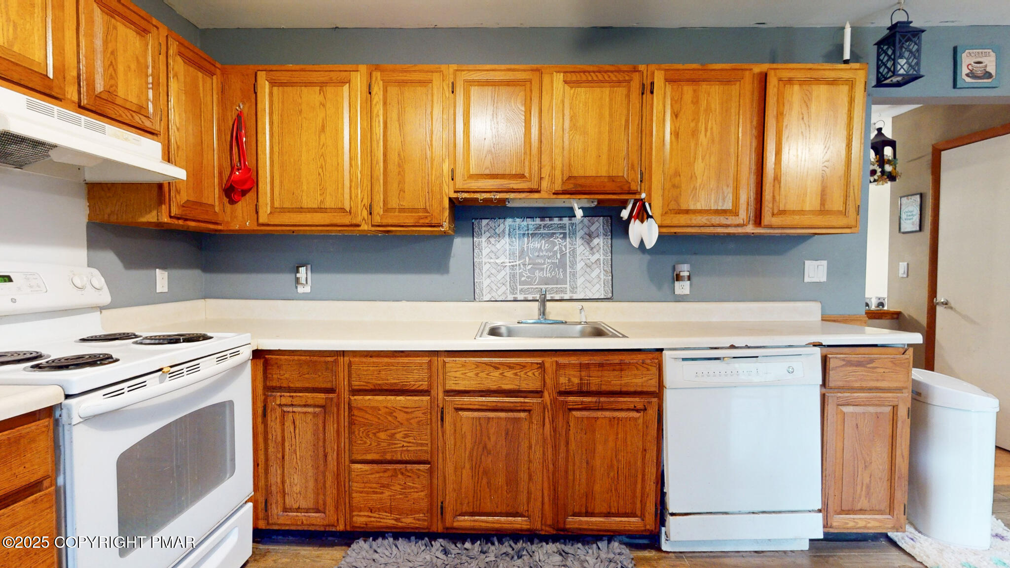 619 Rimrock Road Bartonsville, PA 18321 - Photo 11 of 65 a kitchen with stainless steel appliances granite countertop a sink a stove and a refrigerator