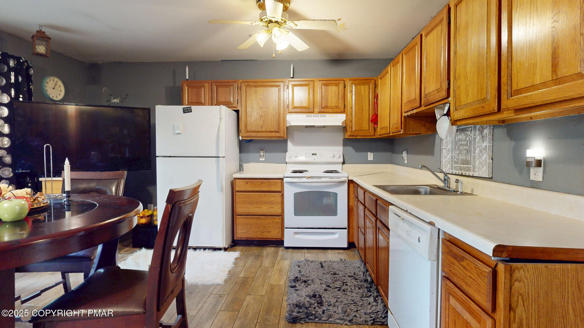 619 Rimrock Road Bartonsville, PA 18321 - Photo 13 of 65 a kitchen with a stove a sink and a refrigerator