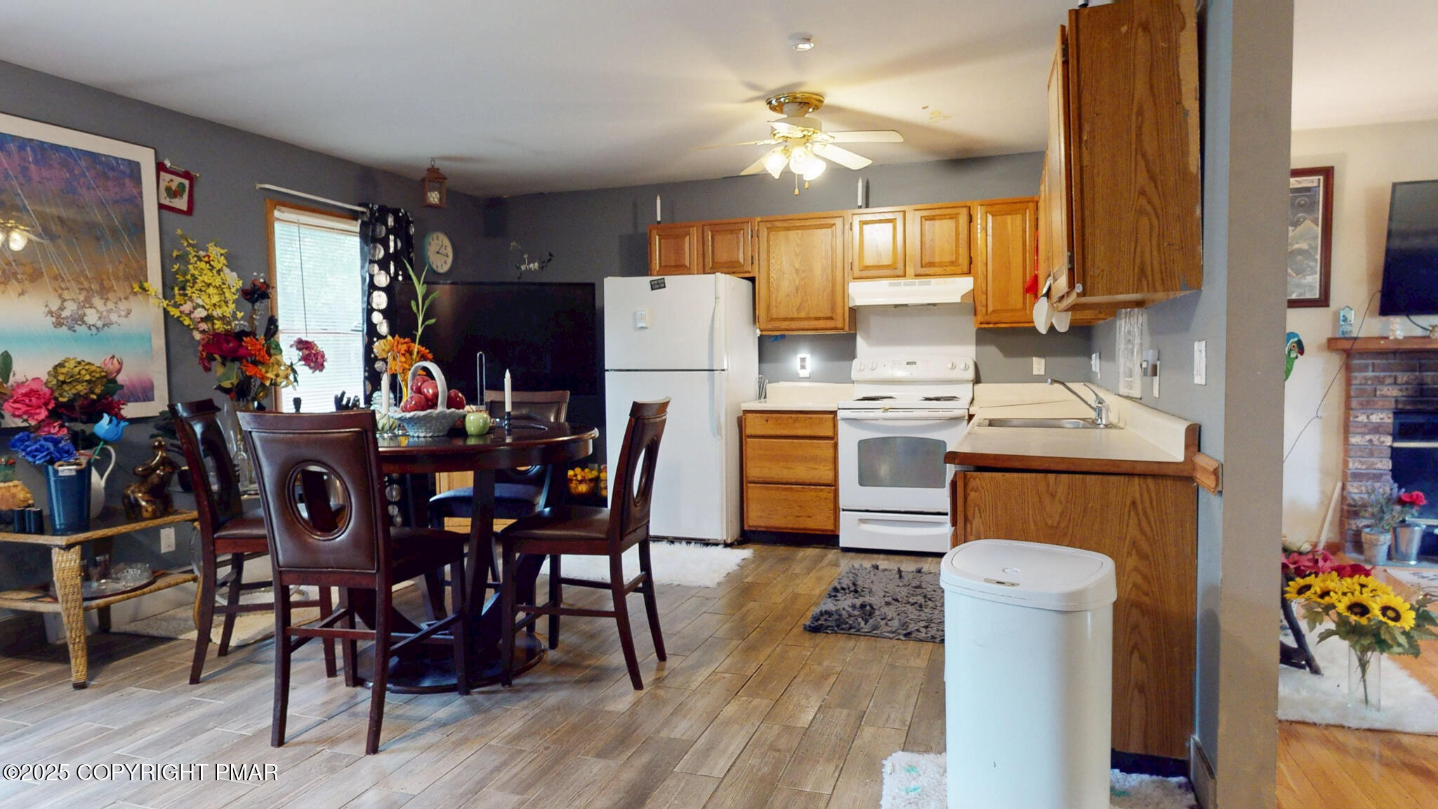 619 Rimrock Road Bartonsville, PA 18321 - Photo 16 of 65 a dining room filled chandelier and wooden floor