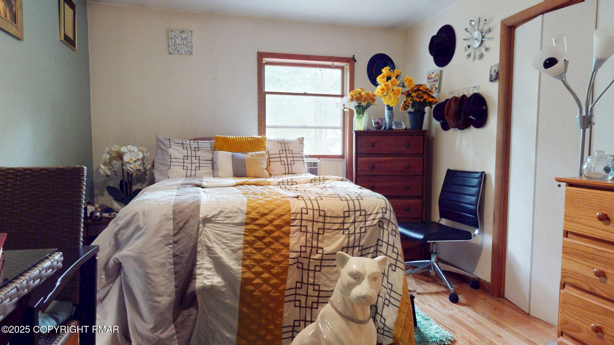 619 Rimrock Road Bartonsville, PA 18321 - Photo 27 of 65 a bedroom with a bed and wooden floor