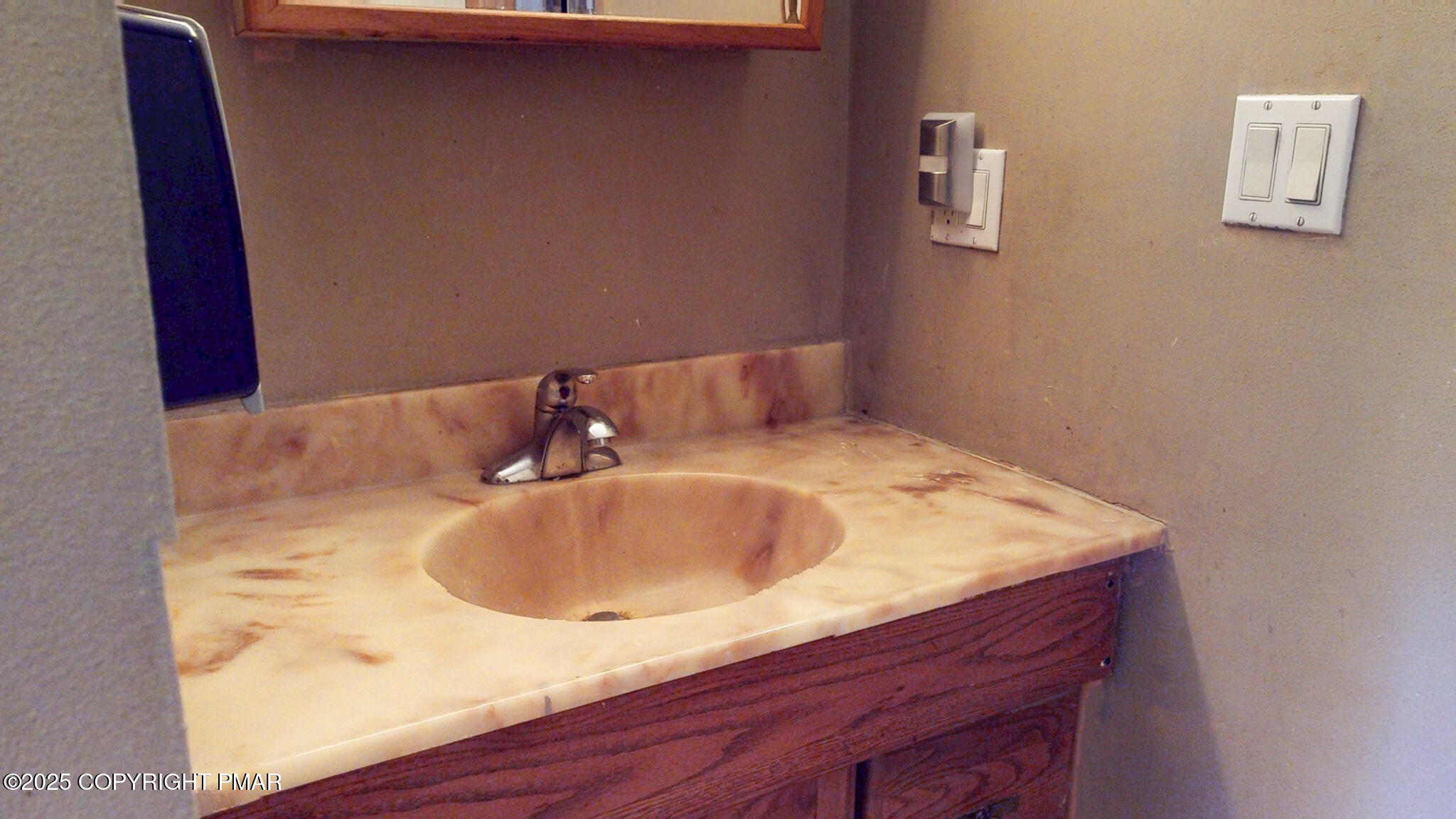 619 Rimrock Road Bartonsville, PA 18321 - Photo 30 of 65 a bathroom with a sink and a mirror