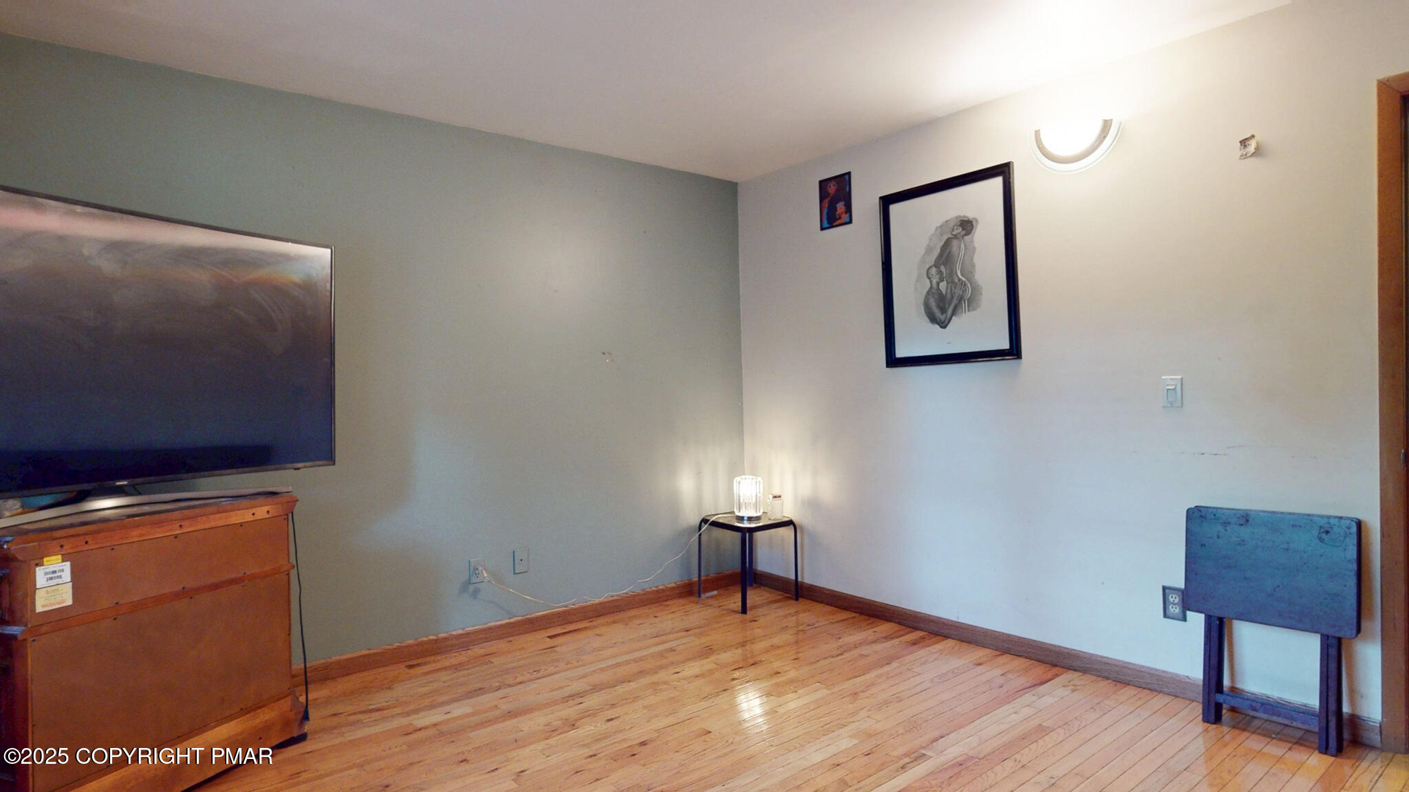 619 Rimrock Road Bartonsville, PA 18321 - Photo 32 of 65 a view of empty room with wooden floor and fan
