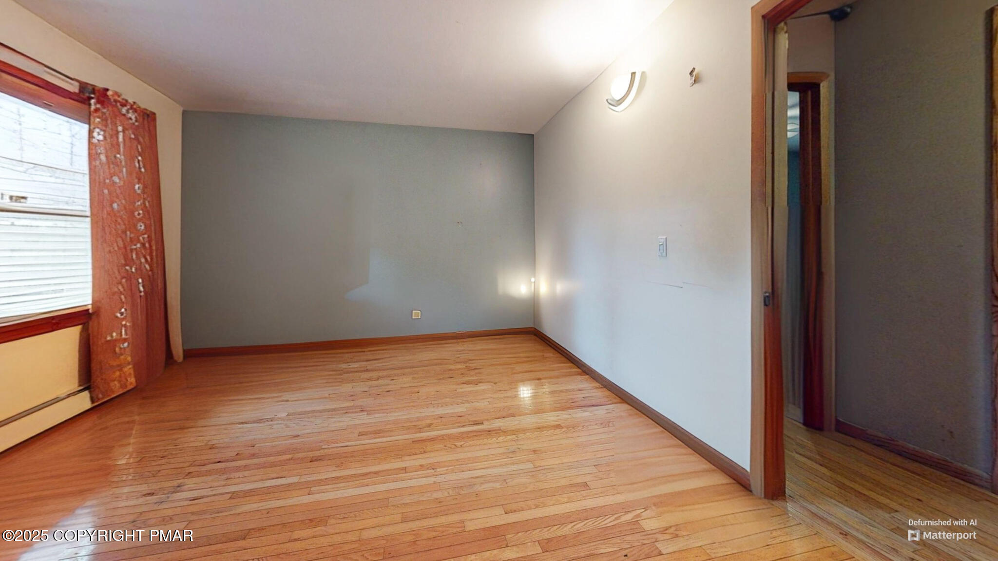 619 Rimrock Road Bartonsville, PA 18321 - Photo 34 of 65 a view of an empty room with wooden floor and a window