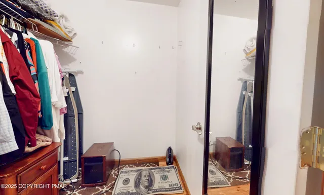 a bathroom with a sink toilet and a mirror