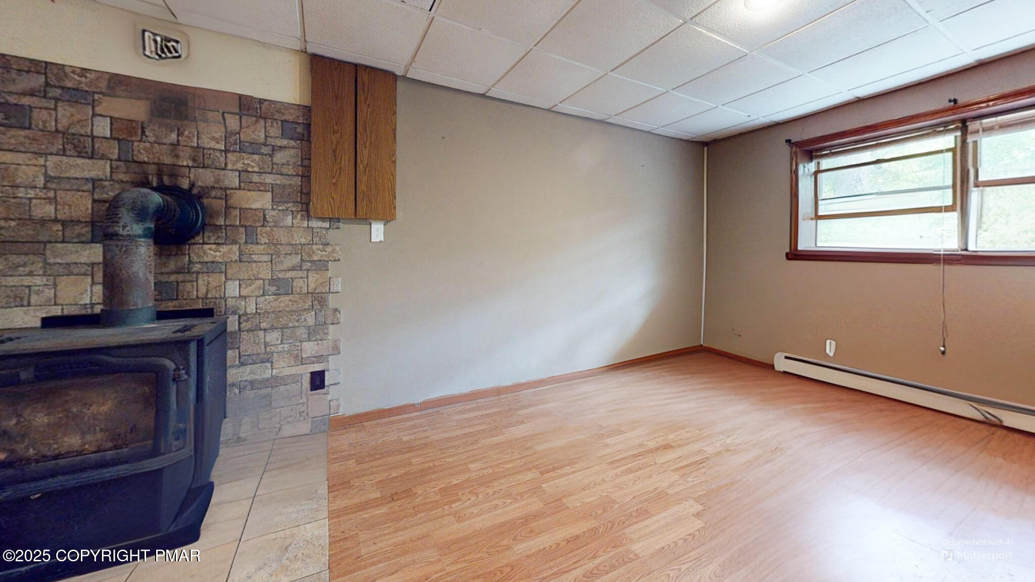 619 Rimrock Road Bartonsville, PA 18321 - Photo 44 of 65 a view of an empty room with a fireplace
