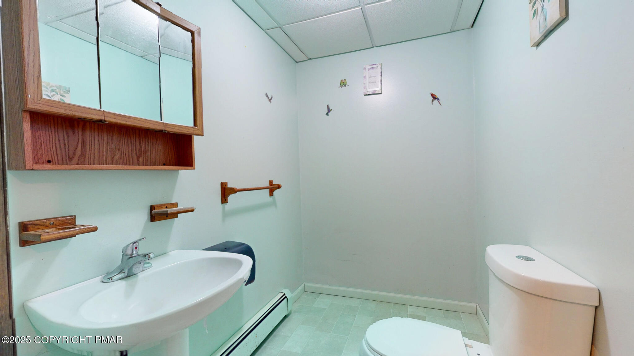 619 Rimrock Road Bartonsville, PA 18321 - Photo 49 of 65 a bathroom with a sink toilet and a mirror