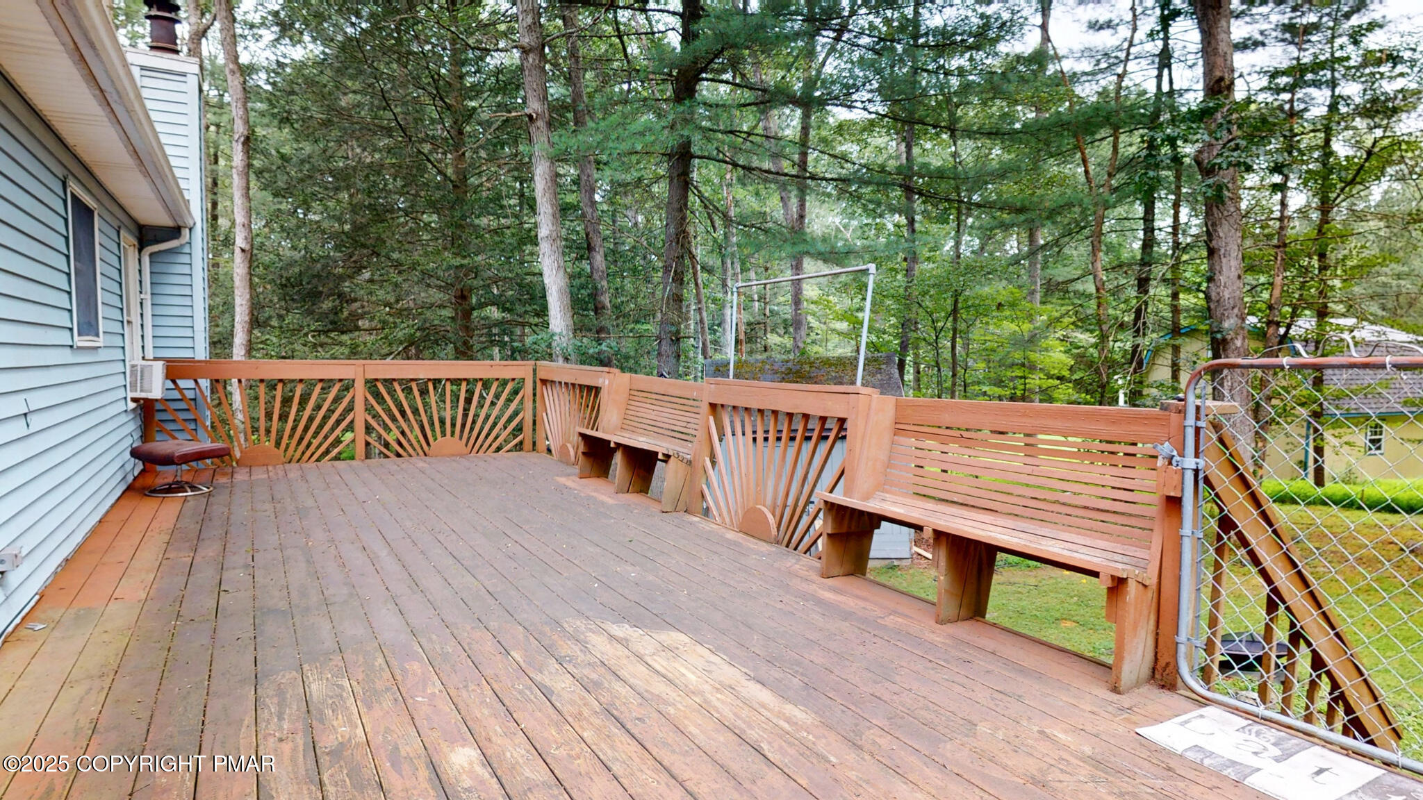 619 Rimrock Road Bartonsville, PA 18321 - Photo 55 of 65 a view of a wooden deck with chairs