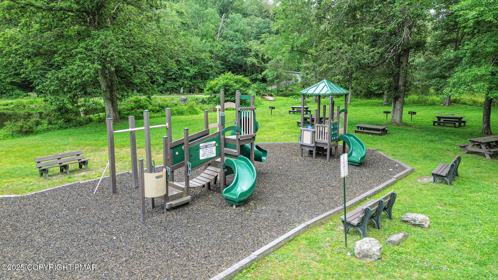 619 Rimrock Road Bartonsville, PA 18321 - Photo 61 of 65 a view of a park with slides