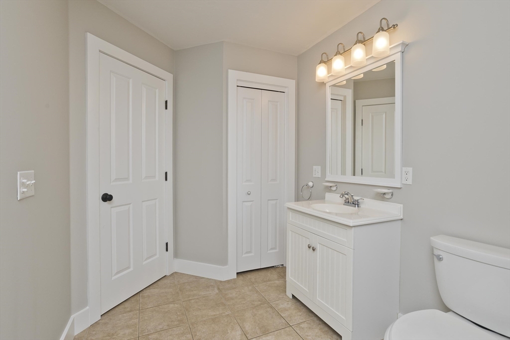 59 James Road Ware, MA 01082 - Photo 41 of 42 a bathroom with a toilet sink and mirror