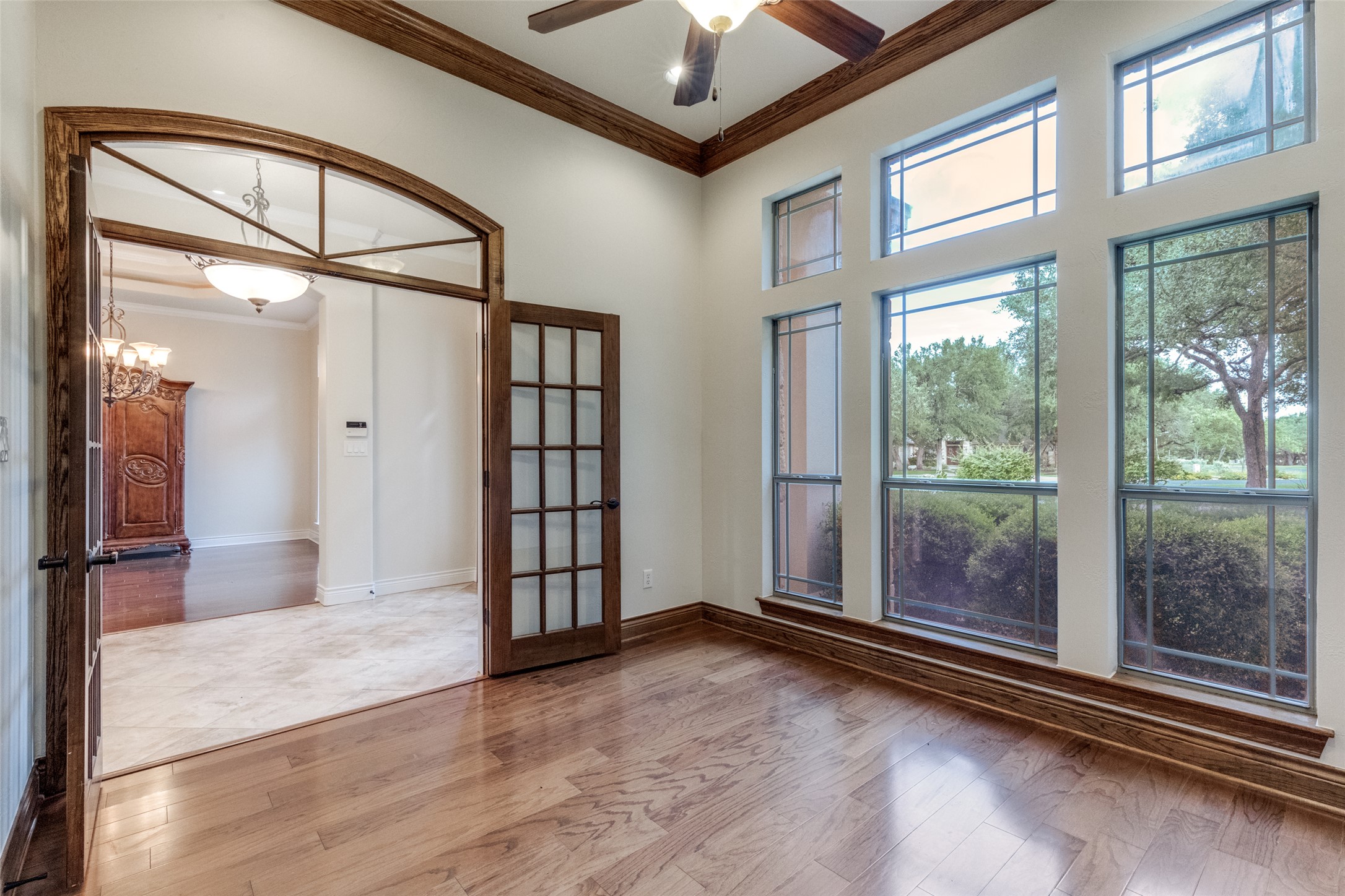 101 Copper Leaf Court Georgetown, TX 78633 - Photo 6 of 31 Hardwood flooring throughout, framed by dark wood trim and baseboards