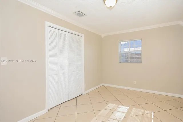 a view of an empty room with window
