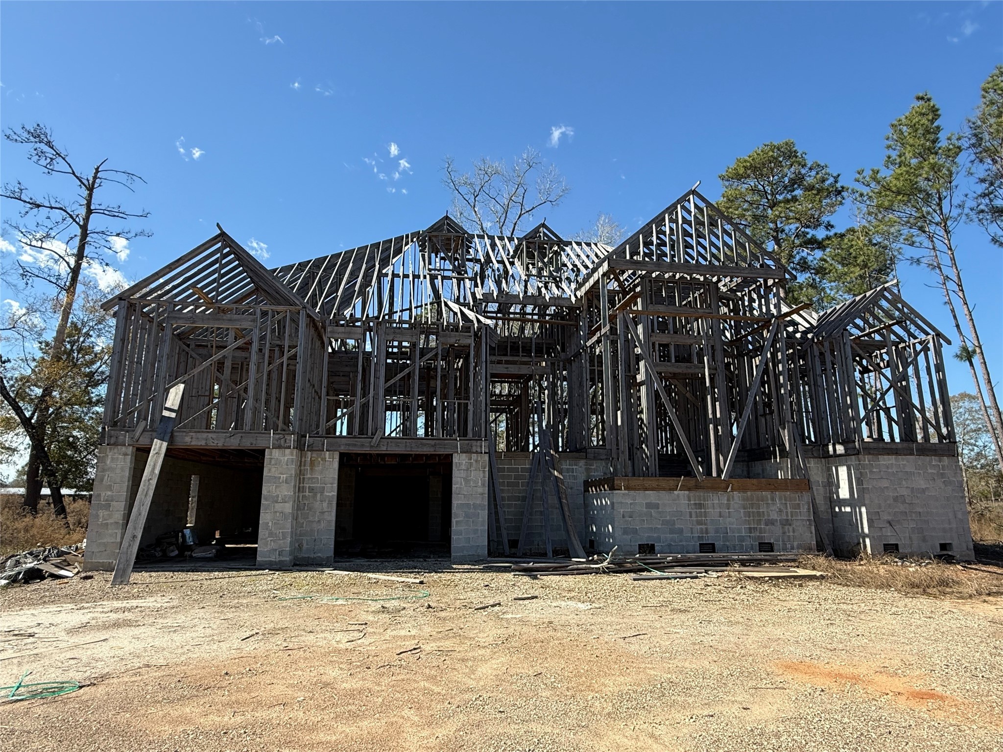 10181 Ehlers Road Conroe, TX 77302 - Photo 6 of 9 a view of a house with a yard