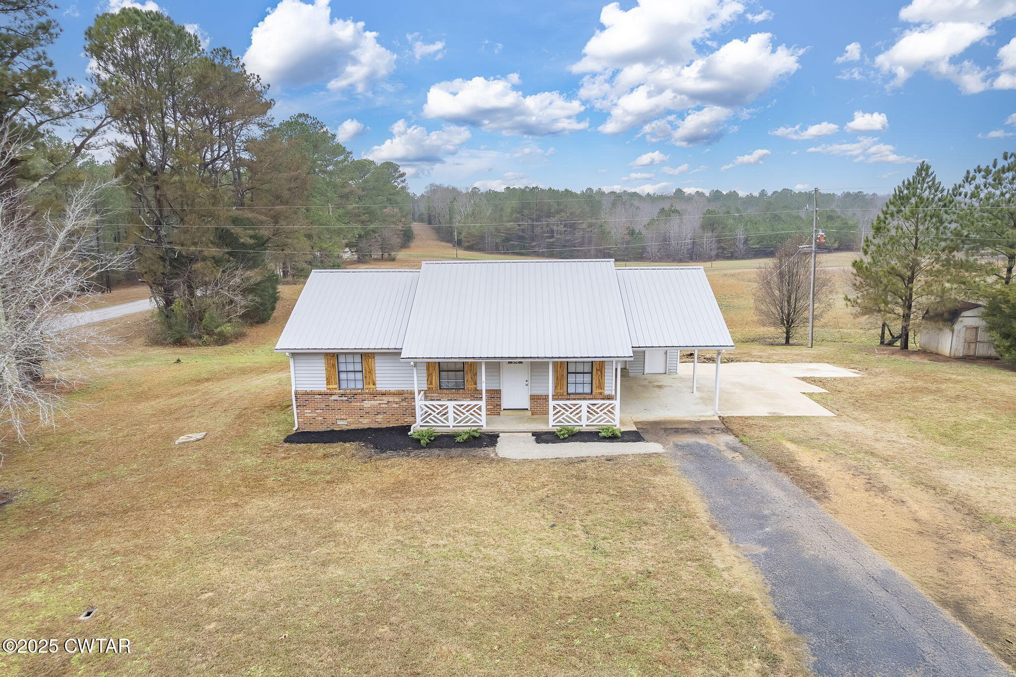 21 Carol Road Huron, TN 38345 - Photo 24 of 29 a view of a house with a patio