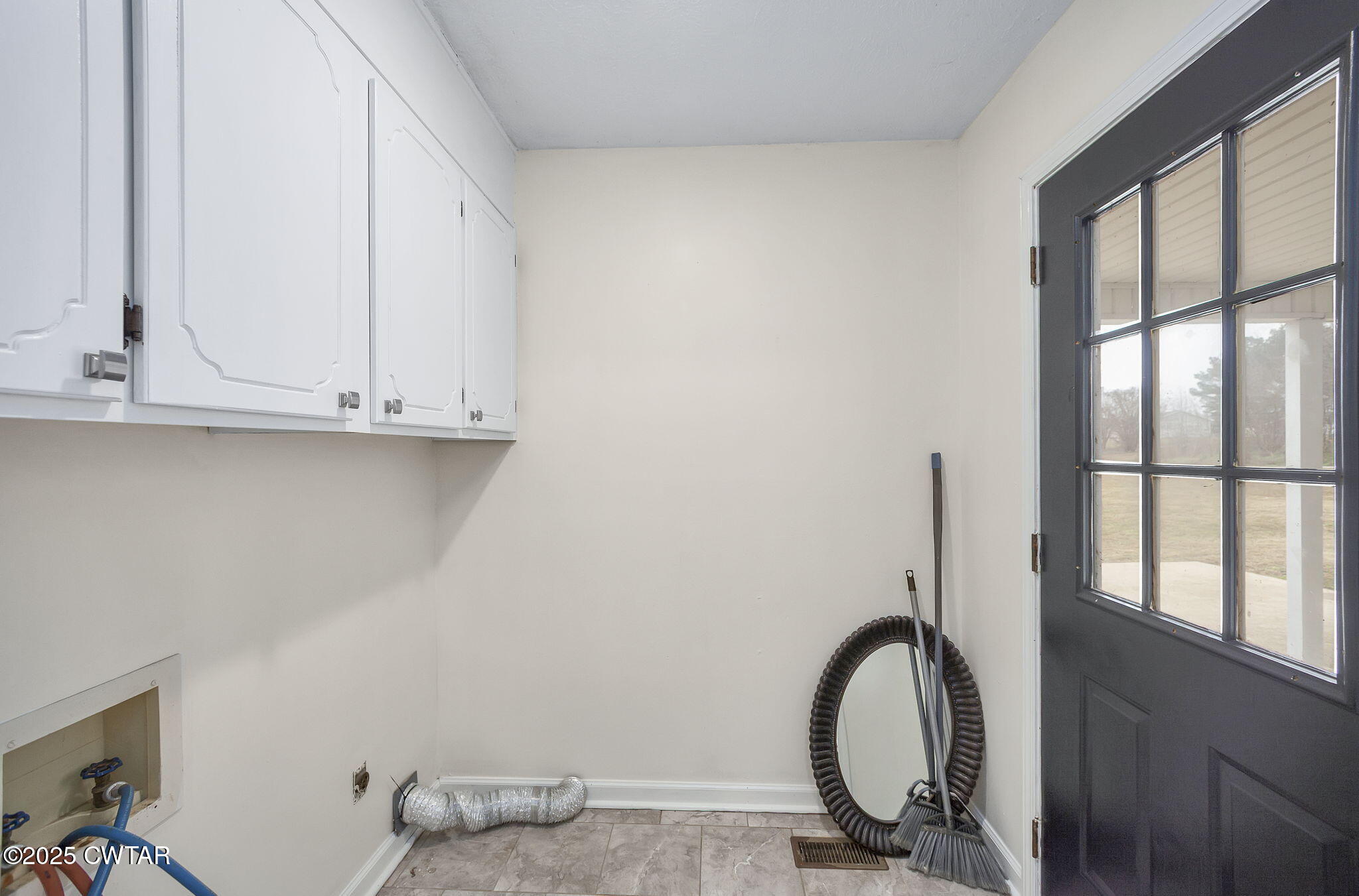 21 Carol Road Huron, TN 38345 - Photo 28 of 29 a view of a storage and utility room with a sink