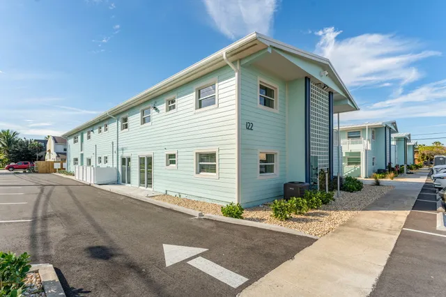 a front view of a house with yard
