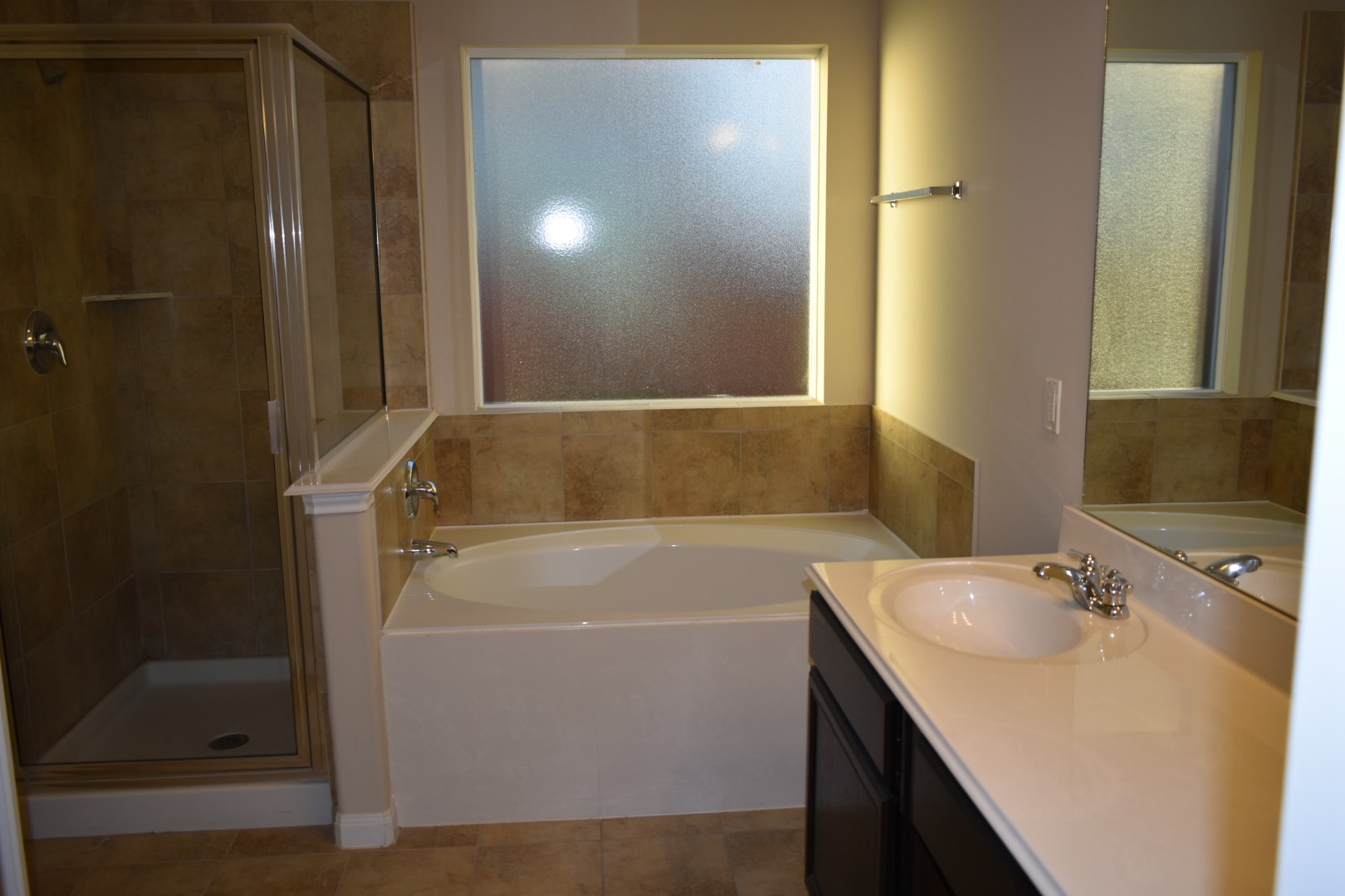 3526 Lily Ranch Drive Katy, TX 77494 - Photo 17 of 23 Master bathroom with double sinks, separate shower and bathtub.
