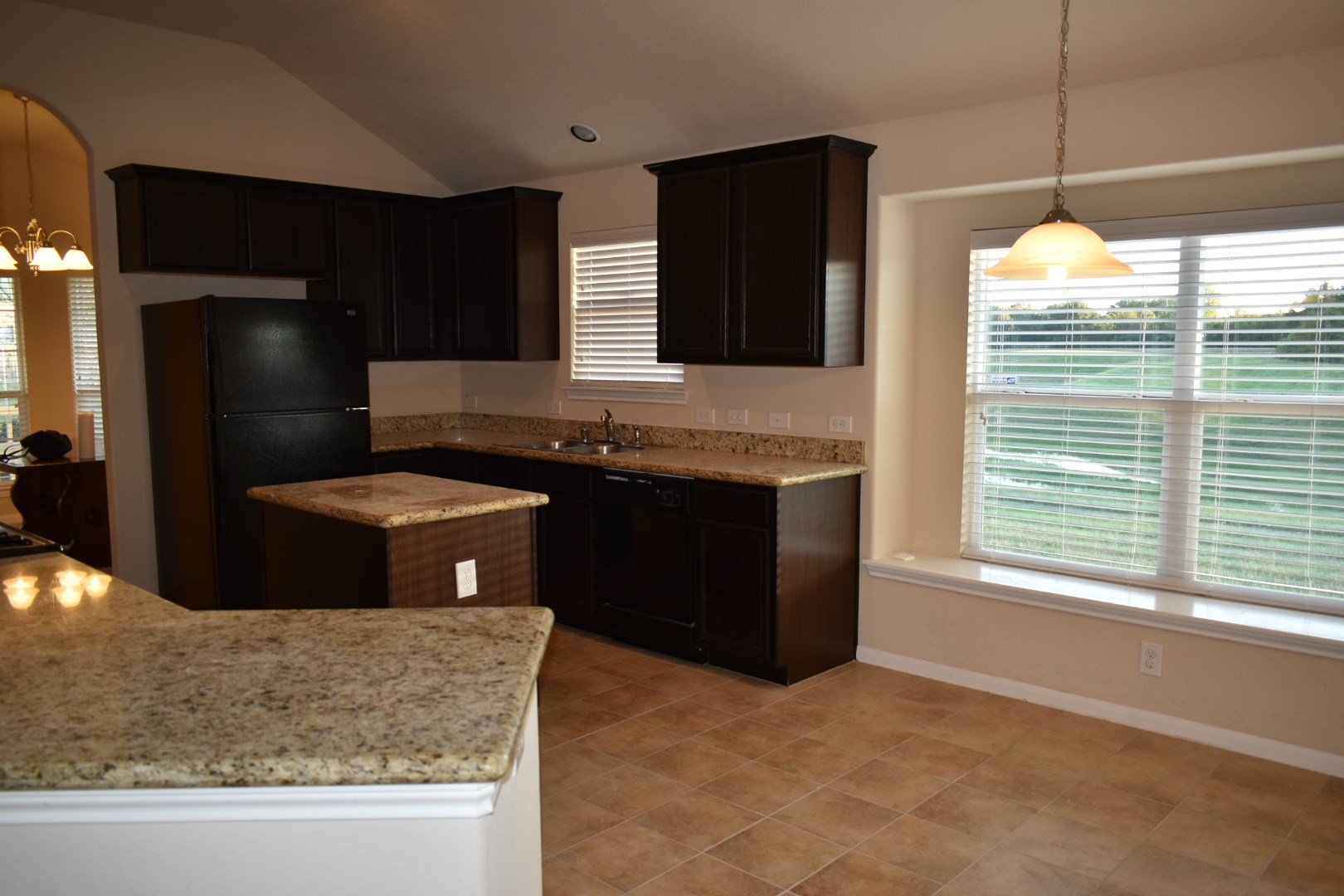3526 Lily Ranch Drive Katy, TX 77494 - Photo 9 of 23 Plenty of counter space and a breakfast area with the view of the greenbelt.