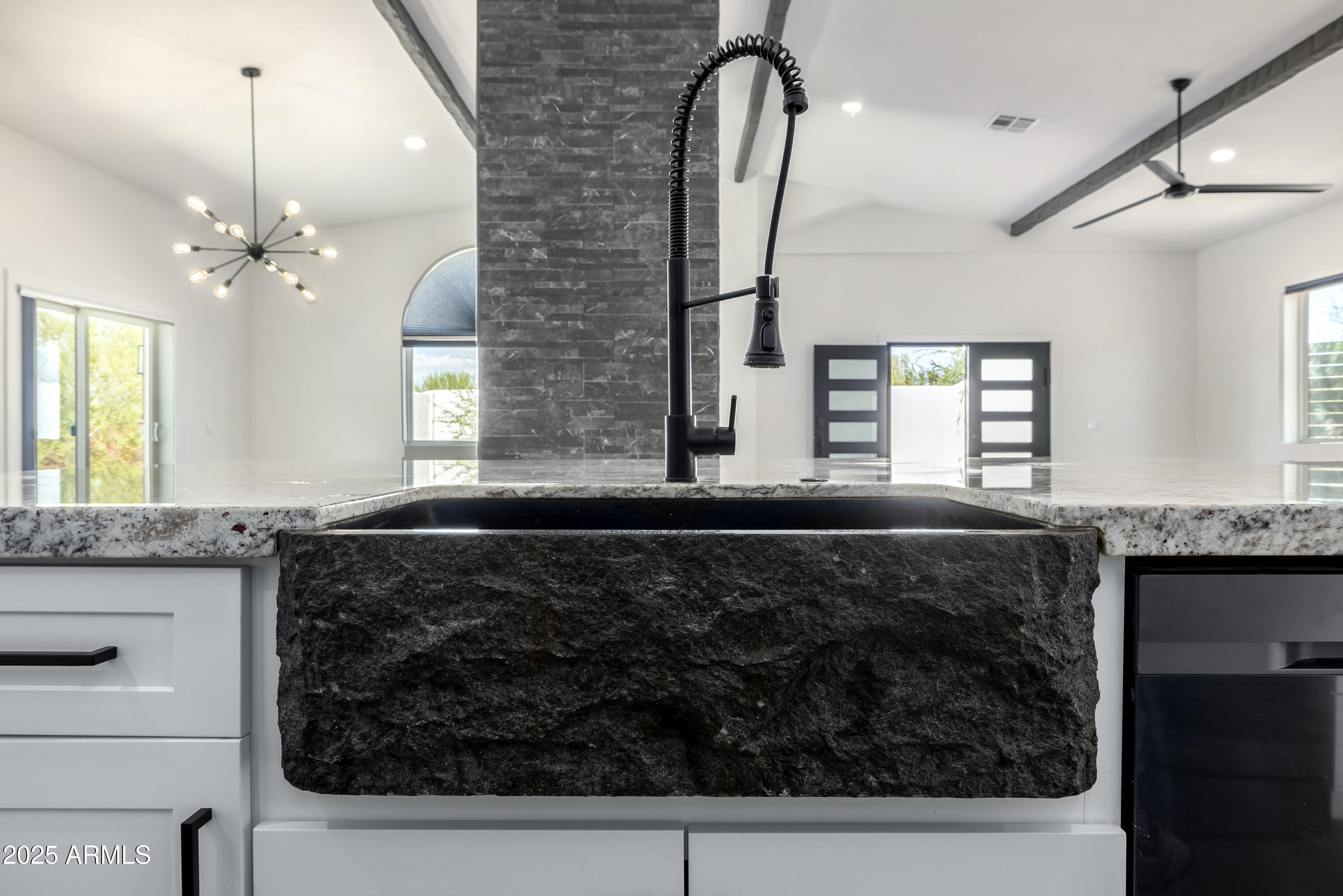 1807 West Joy Ranch Road Phoenix, AZ 85086 - Photo 12 of 49 a bathroom with a granite countertop sink a mirror and window