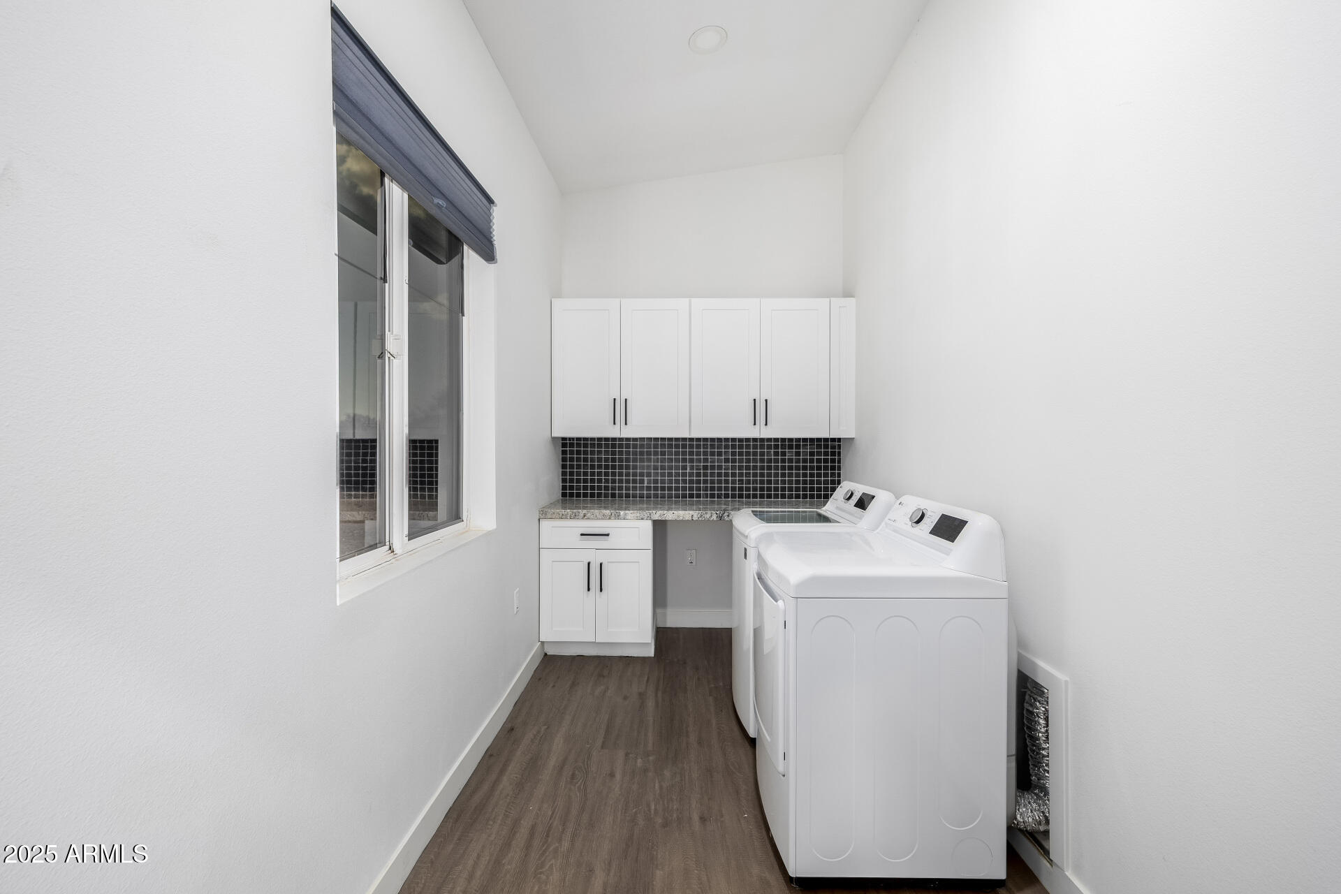 1807 West Joy Ranch Road Phoenix, AZ 85086 - Photo 17 of 49 Laundry Room behind barn door