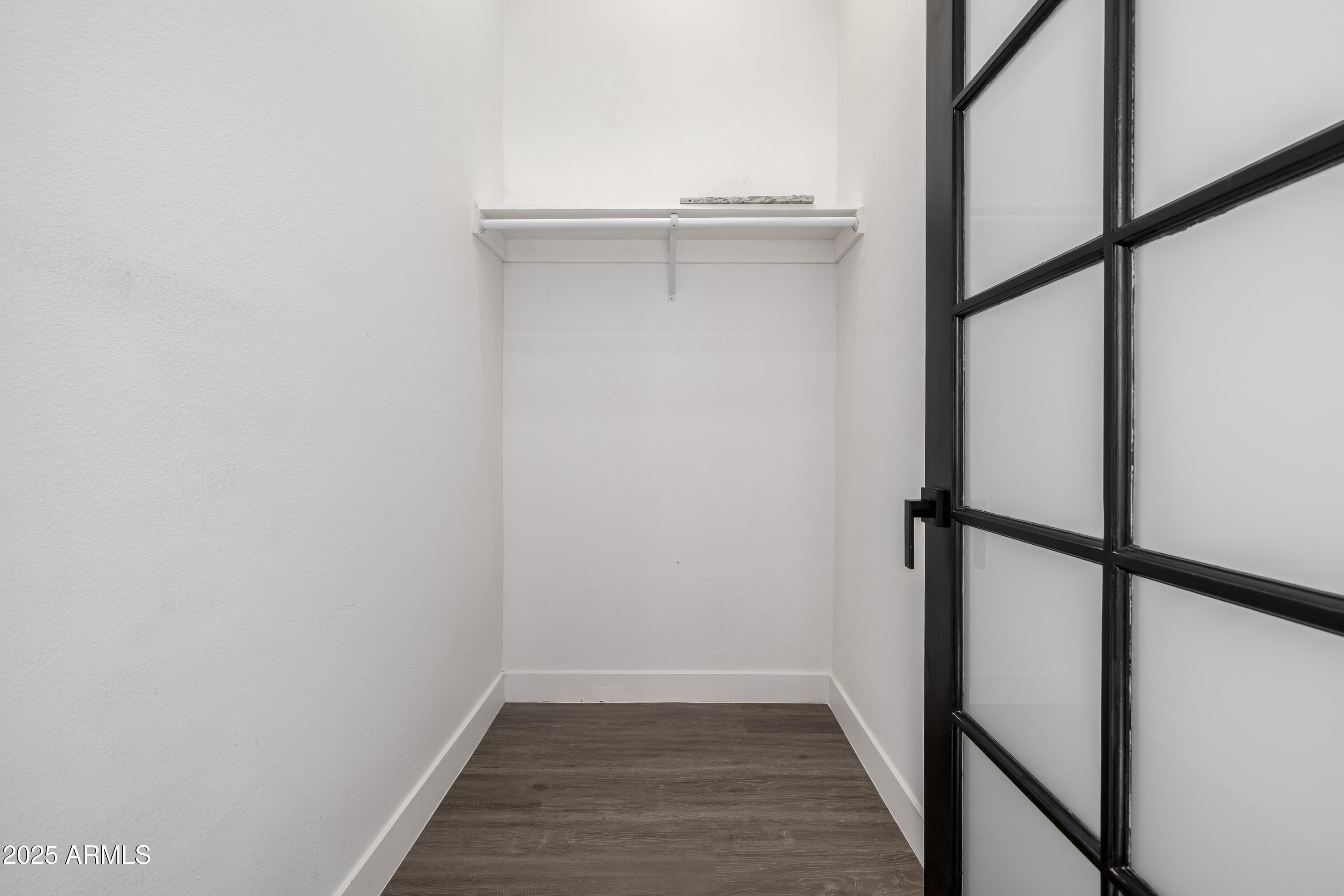 1807 West Joy Ranch Road Phoenix, AZ 85086 - Photo 28 of 49 wooden floor in an empty room