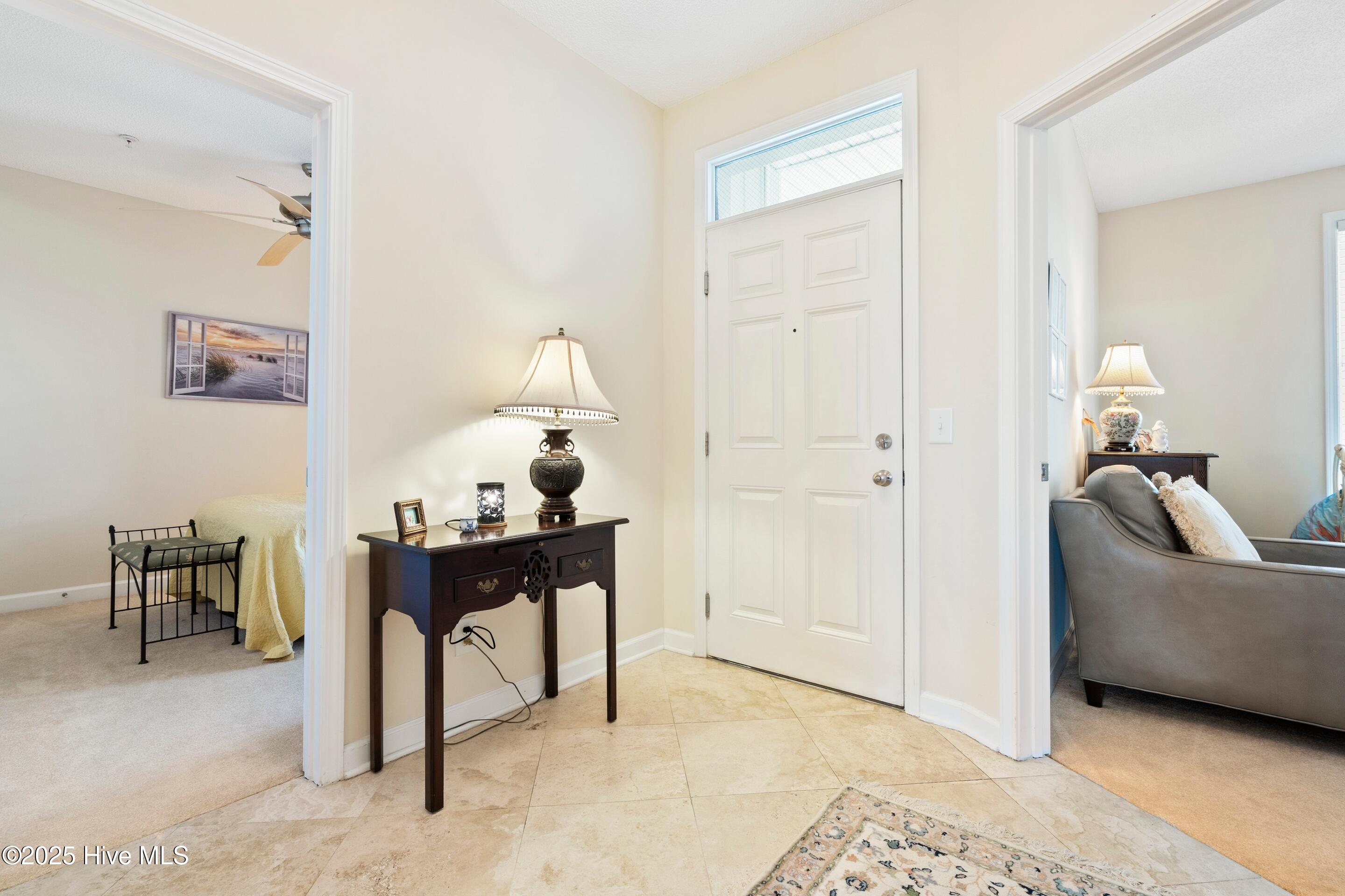 1135 Park Road Southwest, Unit 2304 Sunset Beach, NC 28468 - Photo 6 of 45 Foyer with Travertine floors