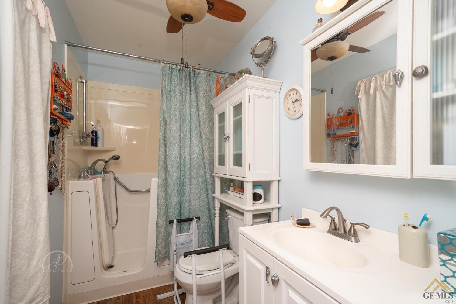 Undisclosed Address Taft, CA 93268 - Photo 13 of 21 a bathroom with a sink a toilet and shower