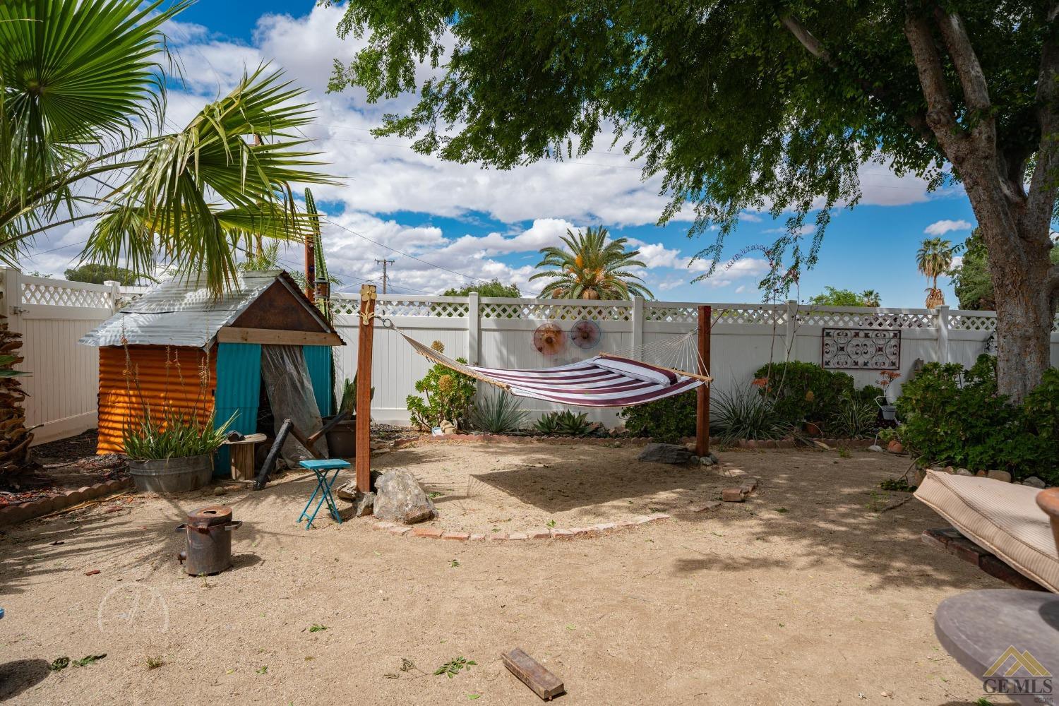 Undisclosed Address Taft, CA 93268 - Photo 14 of 21 a view of a backyard with a sitting area