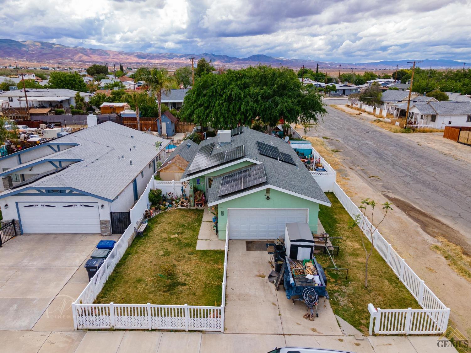 Undisclosed Address Taft, CA 93268 - Photo 2 of 21 a aerial view of a house with a garden