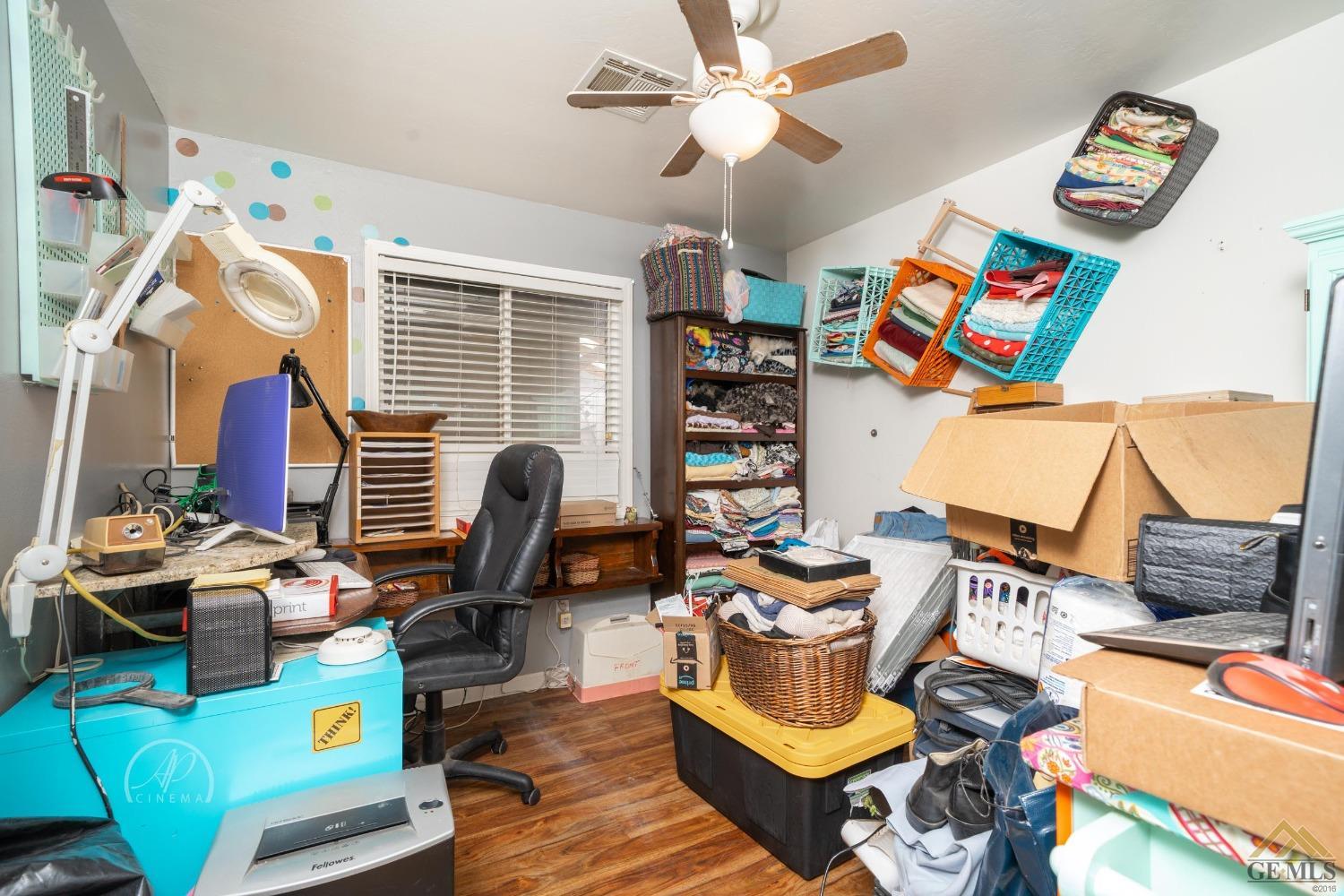 Undisclosed Address Taft, CA 93268 - Photo 10 of 21 a living room with furniture and a window