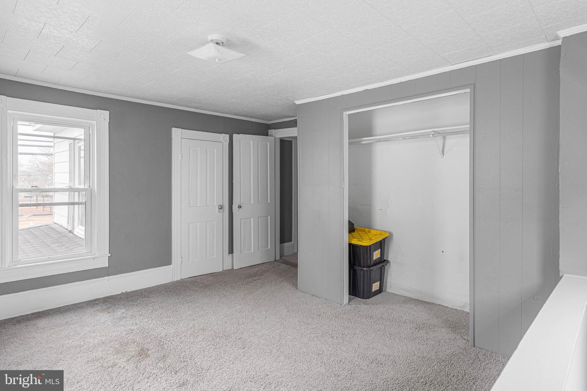 412 East State Street Delmar, MD 21875 - Photo 24 of 36 a view of an empty room with a window