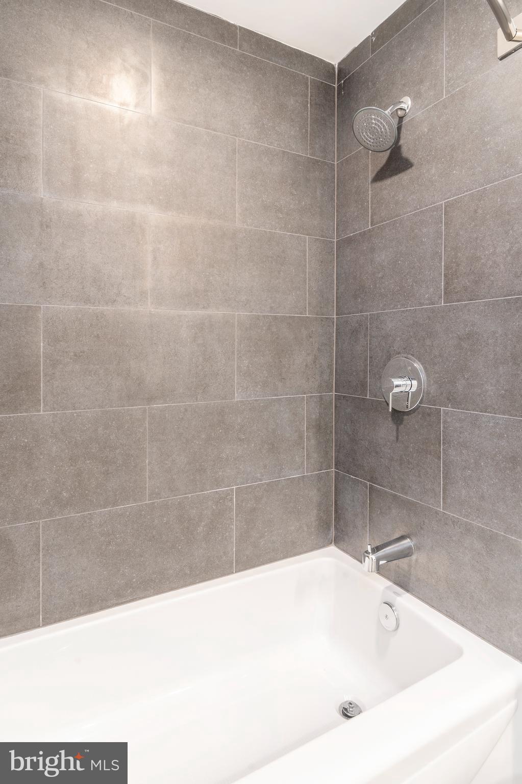 3449 Scotts Lane, Unit B221 Philadelphia, PA 19129 - Photo 11 of 21 a bathroom with a bathtub