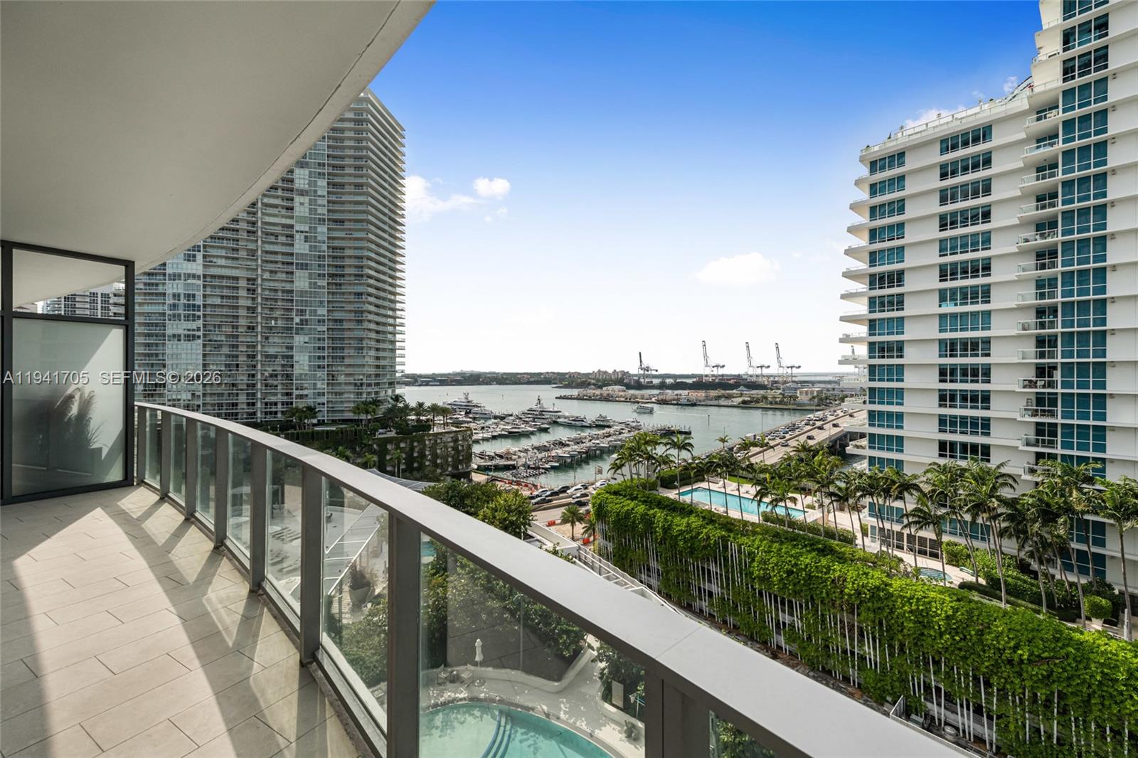500 Alton Road, Unit 1204 Miami Beach, FL 33139 - Photo 12 of 22 a view of a balcony with an outdoor space