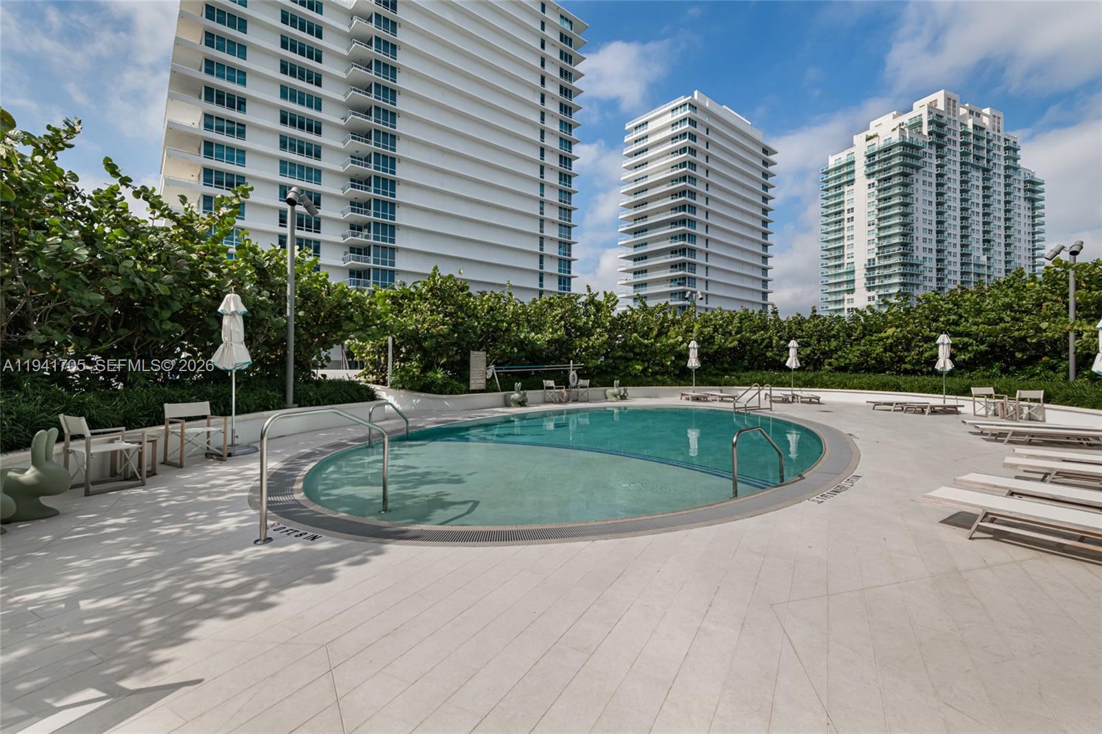 500 Alton Road, Unit 1204 Miami Beach, FL 33139 - Photo 15 of 22 a view of outdoor space yard and swimming pool