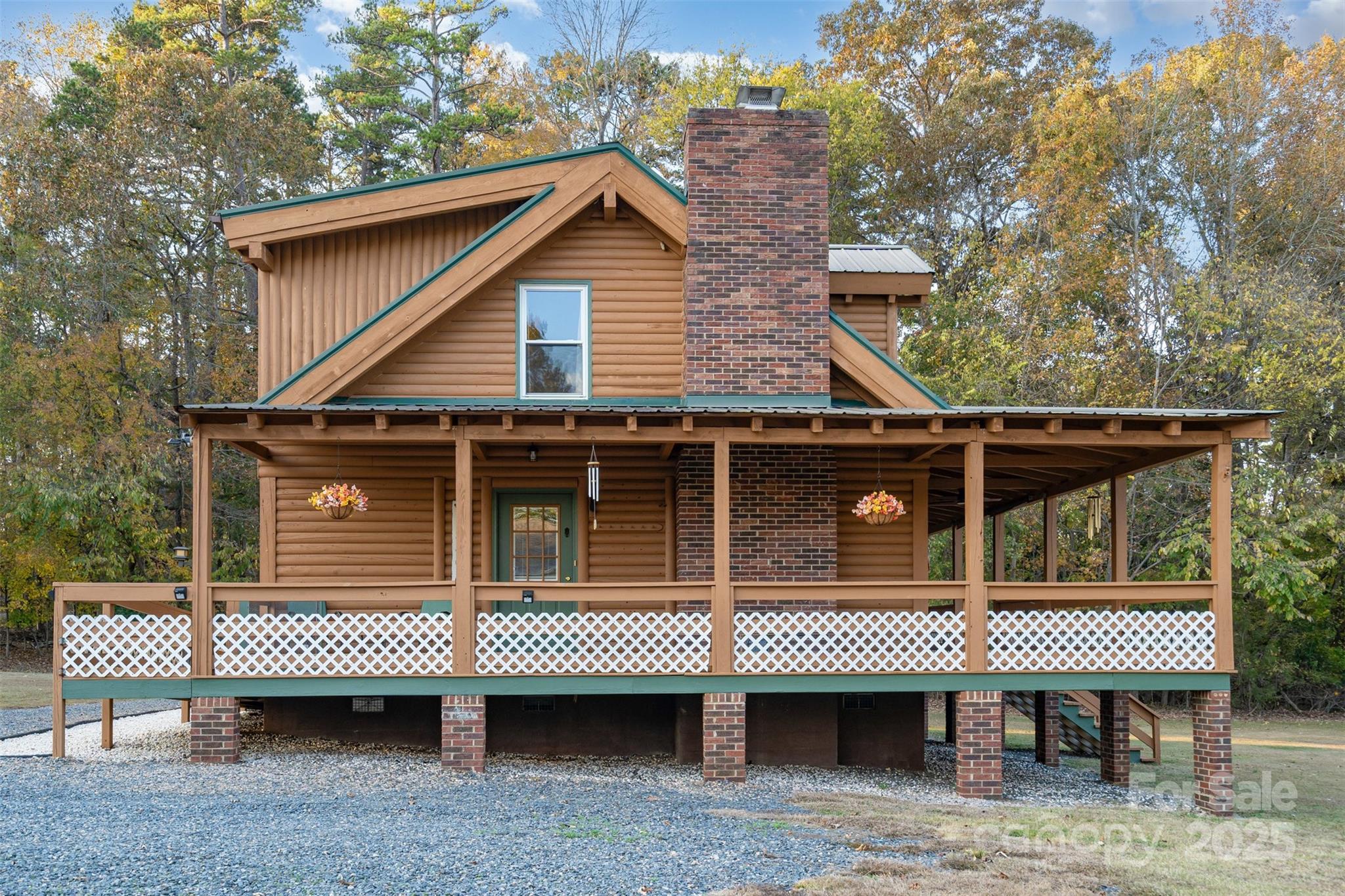 3850 Hahn Boulevard Concord, NC 28025 - Photo 3 of 42 a view of a house with a patio and a wooden fence