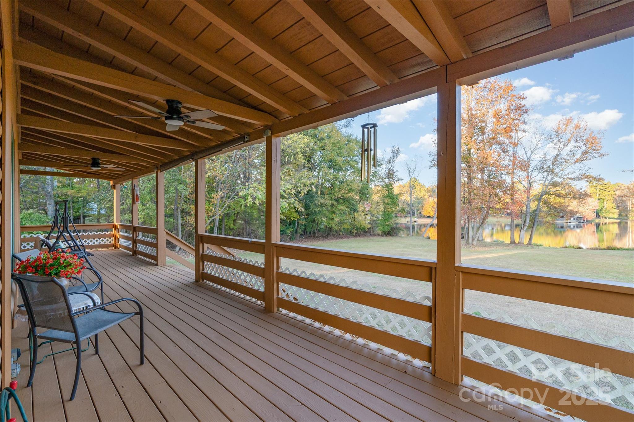 3850 Hahn Boulevard Concord, NC 28025 - Photo 6 of 42 a view of a porch with furniture and wooden floor